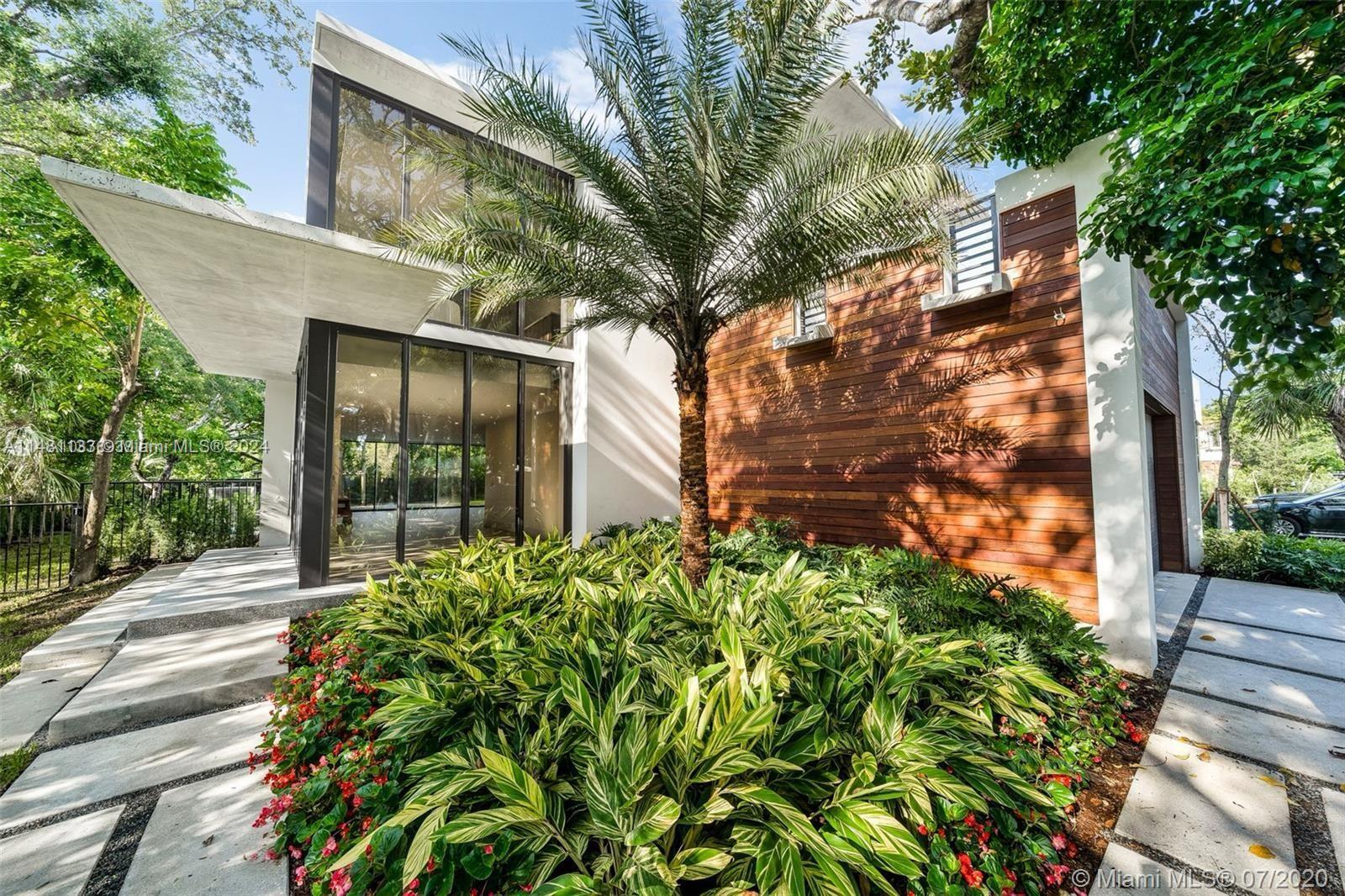 This 4,123 s/f home is meticulously landscaped and includes an impressive oak tree that  welcomes you at your entrance. The home is bright and serene with floor to ceiling windows throughout. An open floor plan seamlessly connects the foyer, dining , sitting room and  eat in kitchen which then leads you to the inviting  sunny backyard with a heated pool and two custom built pergolas ready for entertaining including a  built in grill, and refrigerator. Meticulous attention to detail is presented in the kitchen with new quartz countertops, customized backsplash, freshly finished cabinets, and brand-name appliances. A true sanctuary with impeccable attention to detail.
