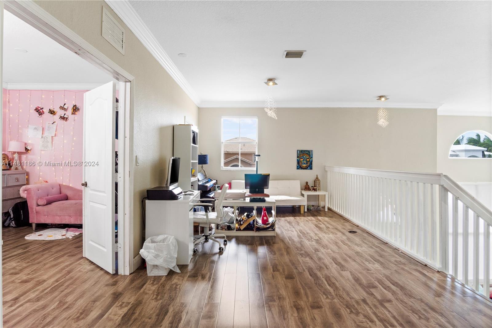 2nd floor hallway can be set up for big office or extra den