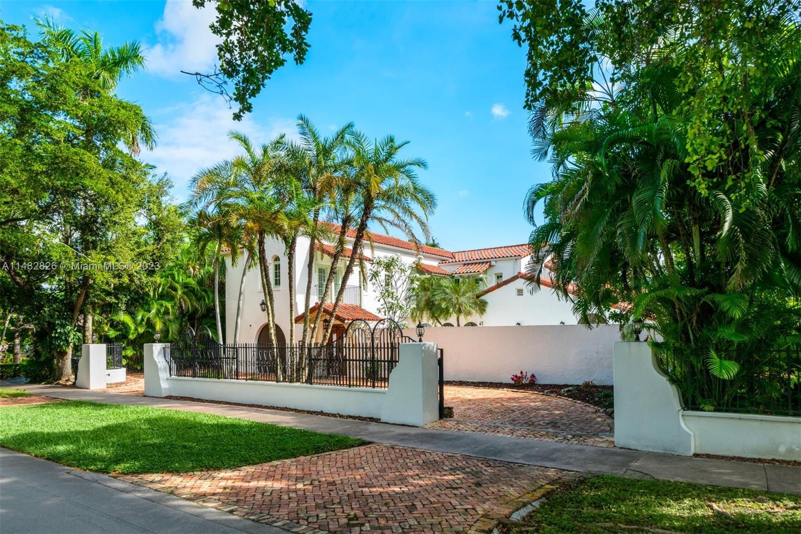 A rare and beautiful Coral Gables 1926 landmark home on a lush 10,500 SF lot. This 4,557 sq ft home features 5 bedrooms and 4 bathrooms. Walk-in California closets, one car garage with storage, courtyard with pool and fountain, spacious terraces, and a heated-salt water pool system. Spacious rooms, high ceilings, wood floors, custom window shutters, fireplace, top of the line appliances and more. New roof in 2020, ADT Pulse System, sprinkler system, hurricane impact windows, and gated.