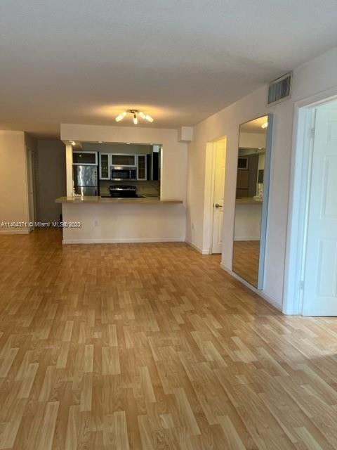 living room and dining reverse view