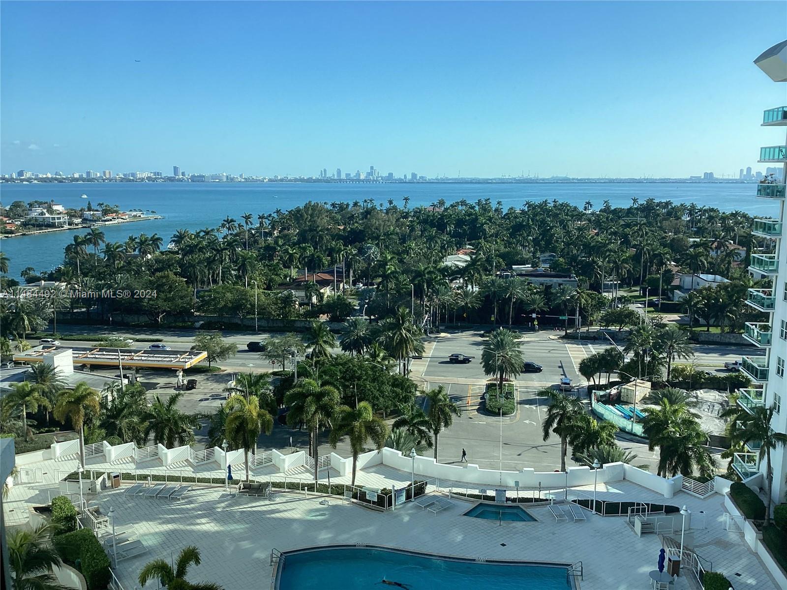 "Just reduced another $10,000 for quick sale" Unique opportunity for a pristine 2 bedroom, in a luxury building in a tropical community in booming North Bay Village. Gorgeous resort style pool, elegant lobby, large gym, fantastic sauna, great waterfront area for strolling, on site management. Spectacular southern view of Biscayne Bay and downtown Miami from a huge patio. Granite kitchen, wood cabinets, washer, dryer. Unlimited Valet Service. Kayak and paddle board launch area. Very close to restaurants and a brand new 36000 sq foot Publix coming soon. Apt come with two assigned parking spaces # 2128 and #2112 and can be rented immediately. Bring your pickiest client…unit sells itself.
