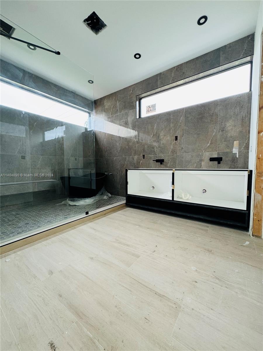 Neutral tone Master Bath with Soaking Tub.