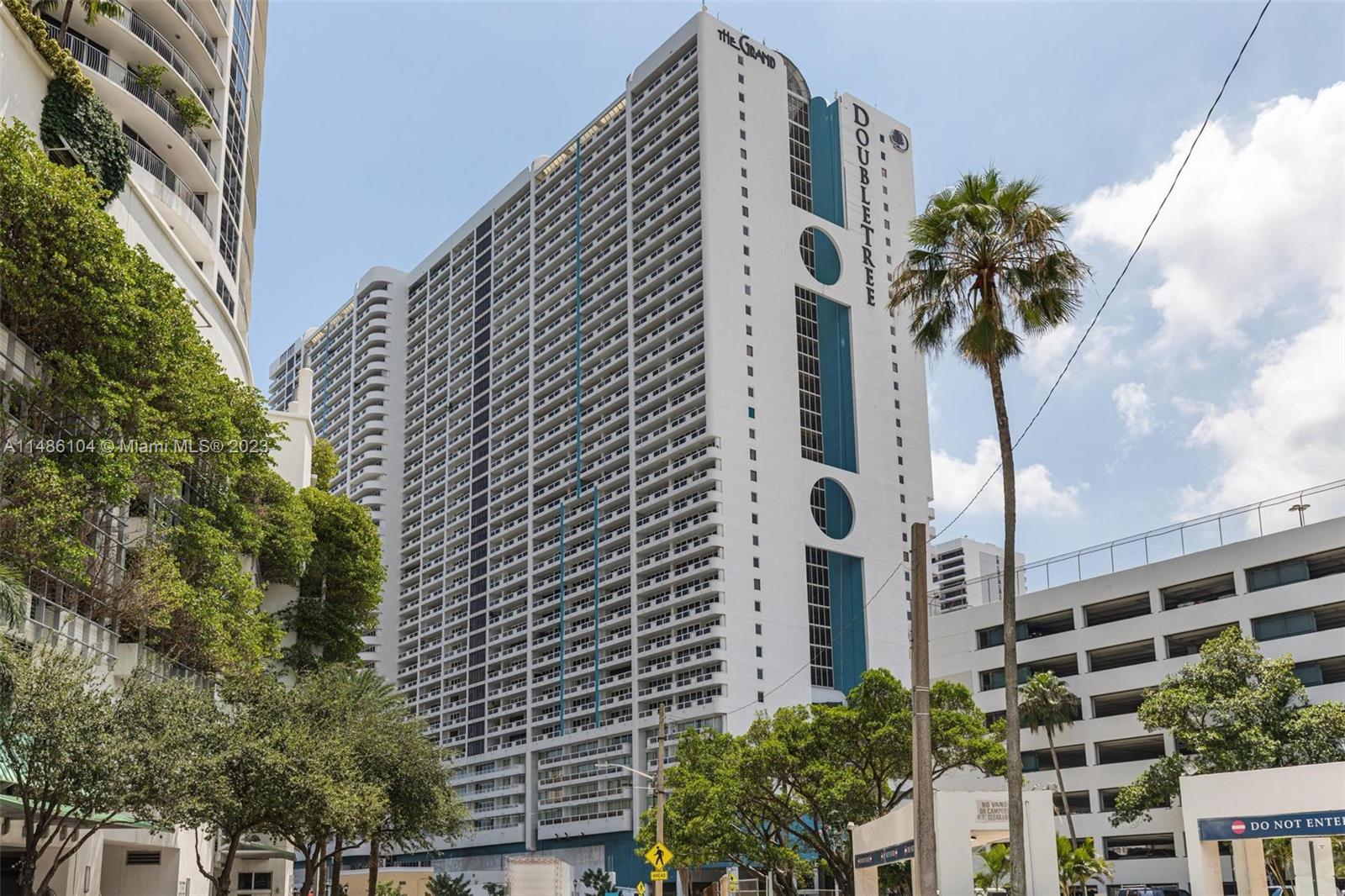 Absolutely stunning and completely remodeled Unit at THE GRAND with beautiful views of Biscayne Bay, located in Edgewater. Enjoy water views from the living room, master room and the custom made kitchen. Freshly painted, with new flooring, impact windows, and modern Washer and Dryer in unit. The building has a resort style pool, gym, shops & restaurants, hair salon, dry cleaners, marina and much more. The Grand boasts a premier location within Miami's Art and Entertainment district. 10 minutes from Miami Beach, 10 minutes from Wyndwood and Brickell. Walking distance to museums, theaters, sports and entertainment arenas, and much more.