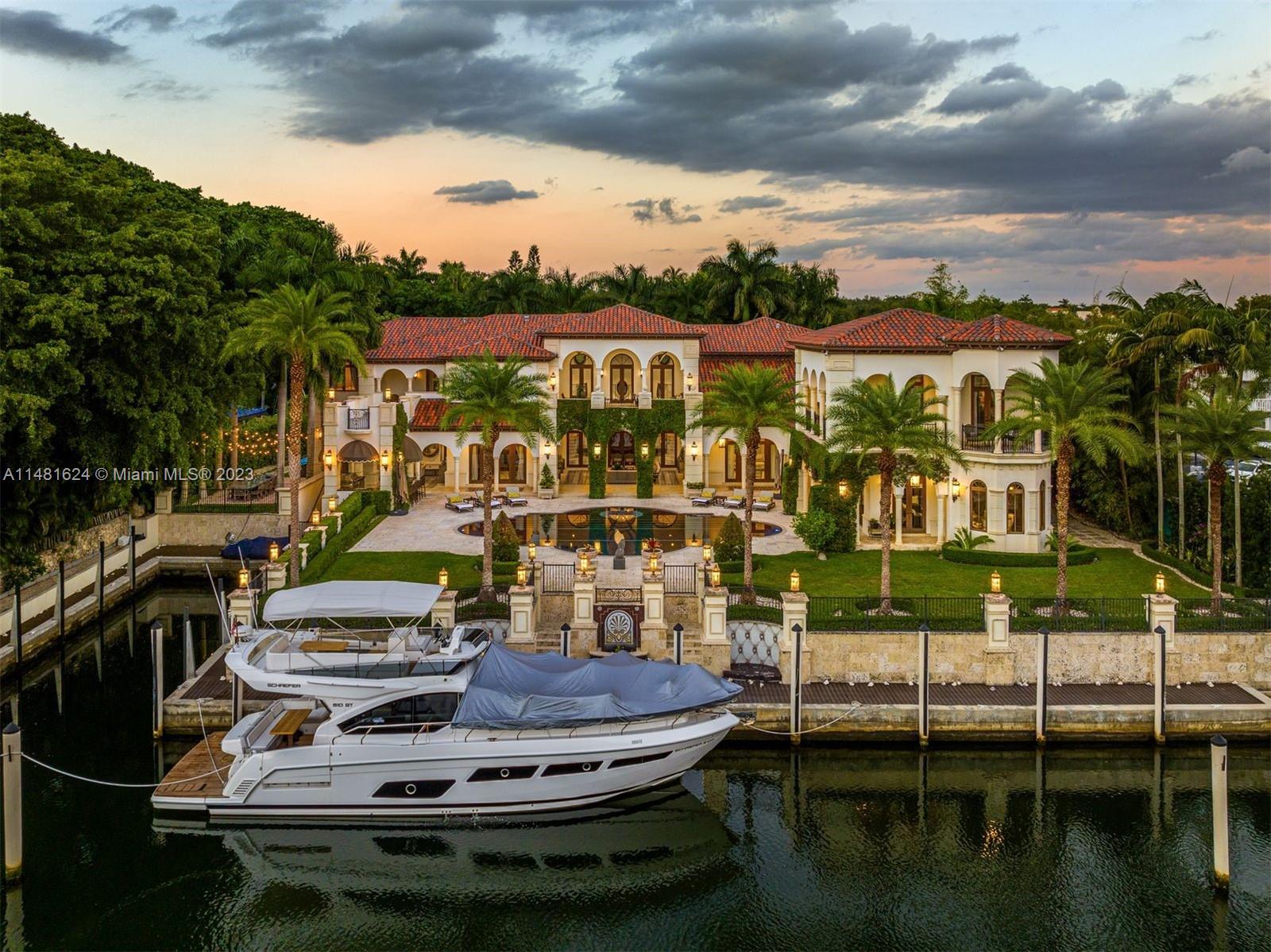 Stunning Mediterranean-style estate situated on prestigious Edgewater drive. Short commute to the Grove. Boasts 180 ft of deep-water frontage as well as a very rare 80-ft inlet slip and direct access to the bay. The home offers luxury and sophistication, showcasing 13,889 sf of living area comprised of 10 bedrooms, 11 full and 2 half baths. Privacy is paramount, enhanced by a private gated driveway leading to the garage and carports capable of accommodating 8 or more cars. Among its features are soaring ceilings, 2 Master Suites, elegant kitchen, dual staircases, 2 separate maid's quarters, office, and 2 elevators. Multiple expansive terraces overlook the expansive backyard with a beautiful pool, and impressive outdoor kitchen—a perfect setting for both relaxation and entertainment.