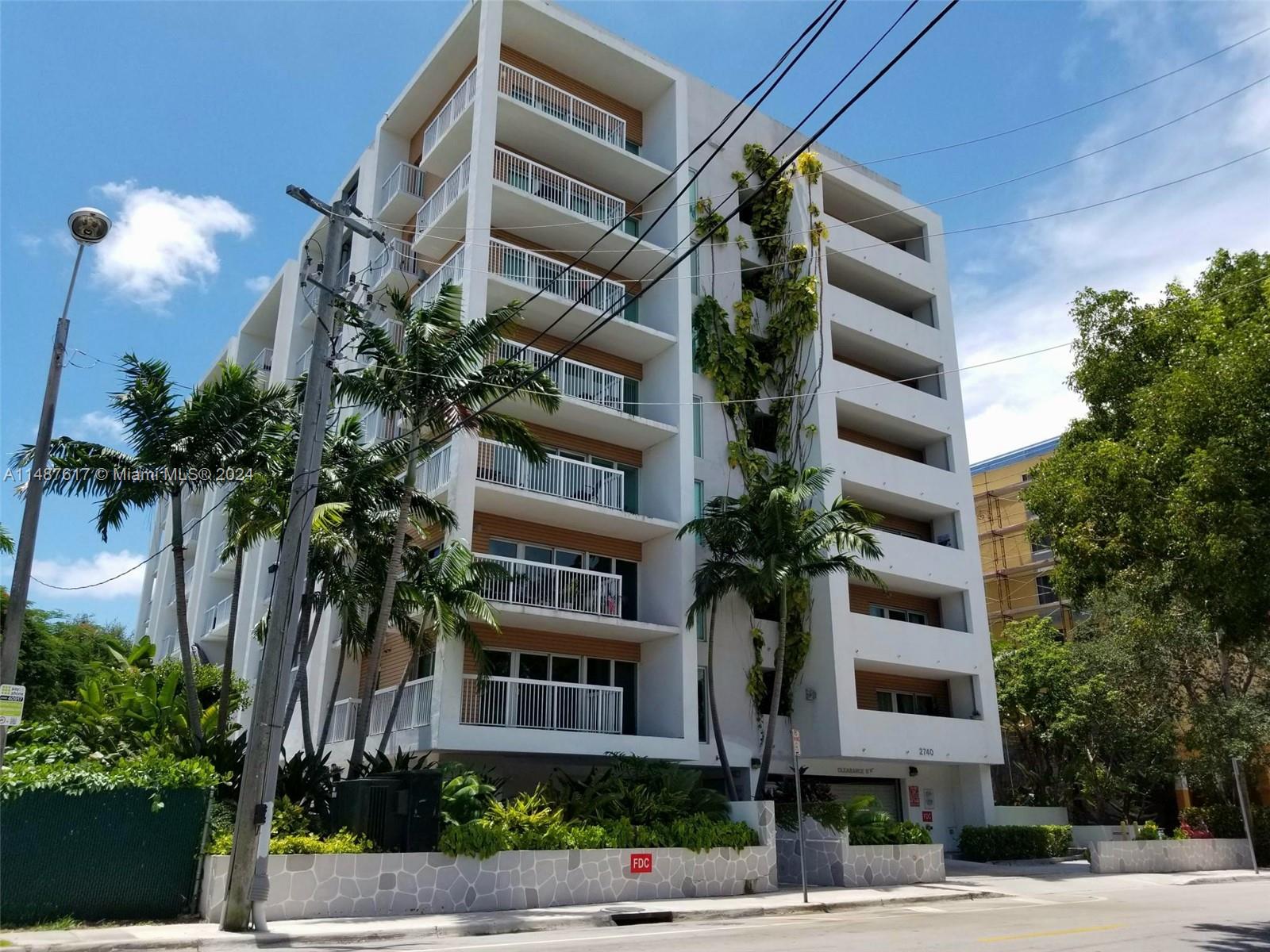 Rarely available 5th floor corner unit at Villaggio in the Grove! Located convenient to US1, Coconut Grove Metro/Grove Central, Berries in the Grove & more! This well-maintained 1/1 features a generous kitchen w/complete appliance set, granite counter tops & eat-in bar. Kitchen is open to a light & bright living area which leads to a large balcony looking into the Grove. Enjoy incredible sunrise views from this private outdoor living space. This 5th floor corner unit, in building's quietest line, shares no party walls w/neighbors. Rarely used convenient interior staircase nearby. Villaggio in the Grove also offers community amenities including gym, rooftop pool w/lounging areas, gated entry, intercom entry + gated & assigned parking. Unit rented at $2400/mth. Lease ends 1/31/2024