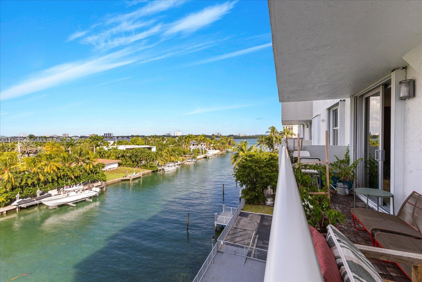 Motivated Seller! Beautiful apartment in Bay Harbor with direct water views from living room, master bed & second bed. Giant master bed w/ walk-in closet and bathroom, huge balcony in the living room & second bedroom overlooking the canal. Open kitchen to living/dining area, impact windows, tile floors, lots of closet space, 1 assigned storage & garage parking. Plenty of light & sunshine facing west, canal and Biscayne Bay. Walk to A+ schools, restaurants, Bal Harbor shops and beach. Building has completed/passed its 40-year inspection & been remodeled with glass balconies, new roof! Building amenities include a salt pool, gym, sauna, doorman, private charging station on site and community dock with exquisite views + lots of sunlight, this is the perfect place to call home, a must see!