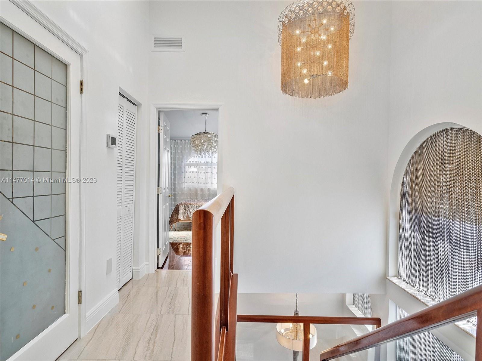 Hallway on 3rd floor and elevator entrance.