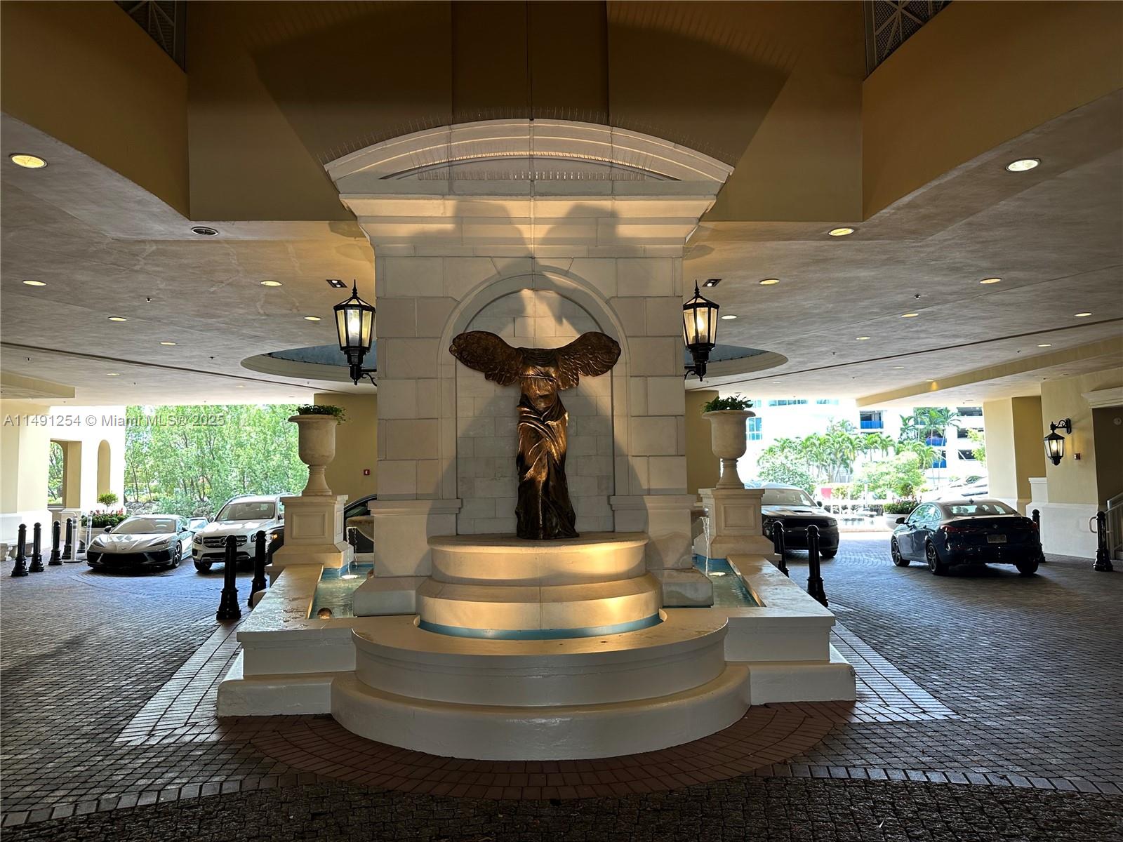 VIEW FROM LIVING AREA TO KITCHEN COUNTER SEATING AREA