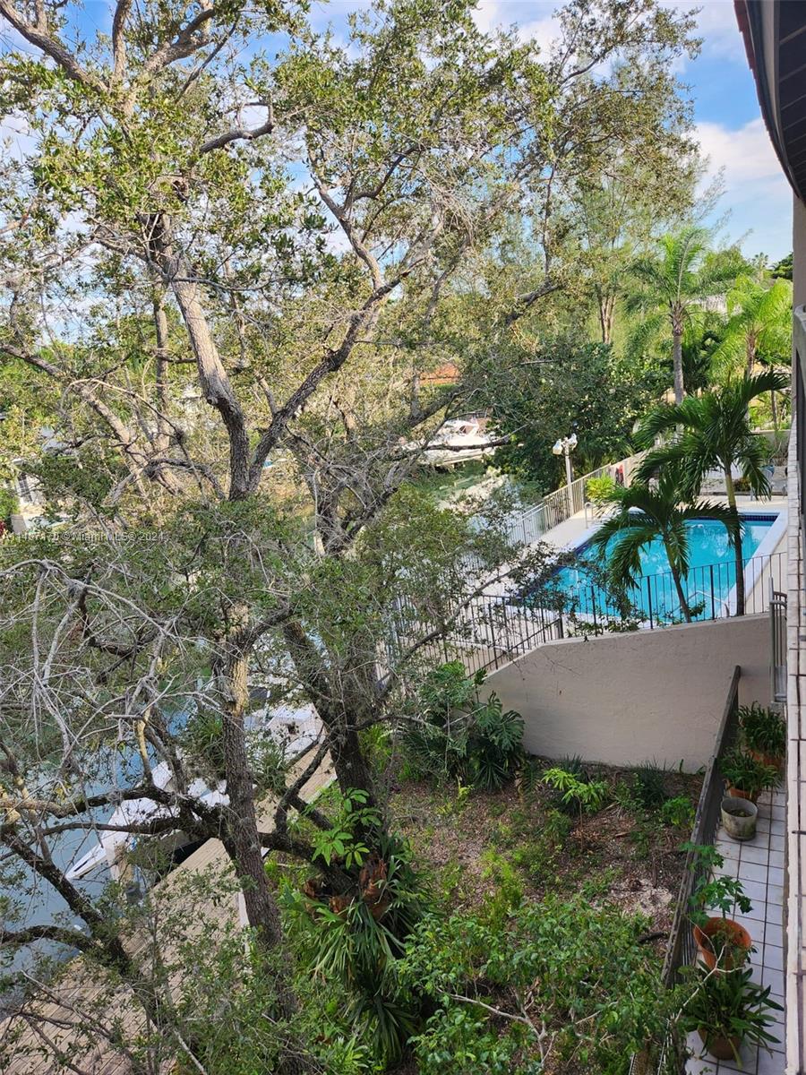 This view shows building pool area from the balcony.