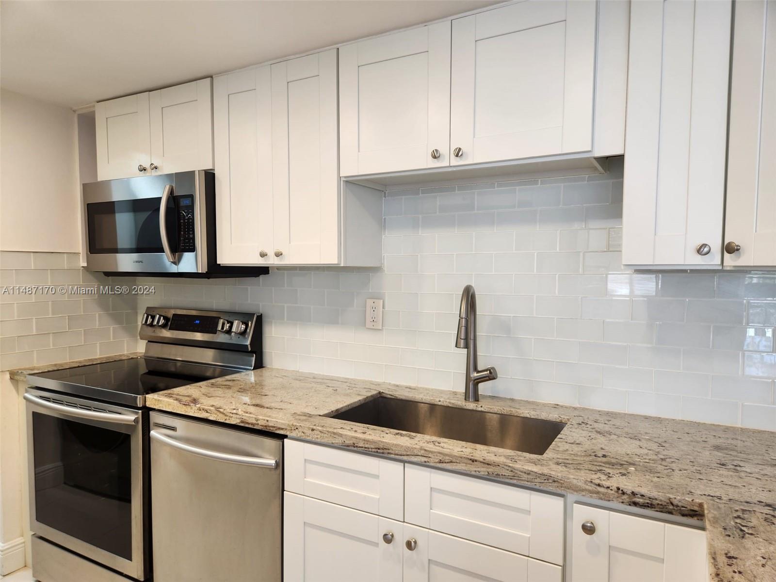 Additional view of kitchen.