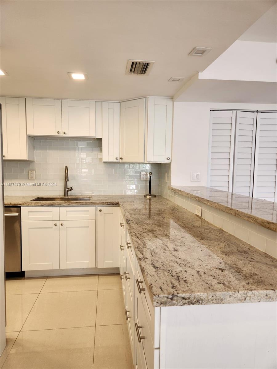 Additional view of kitchen.
