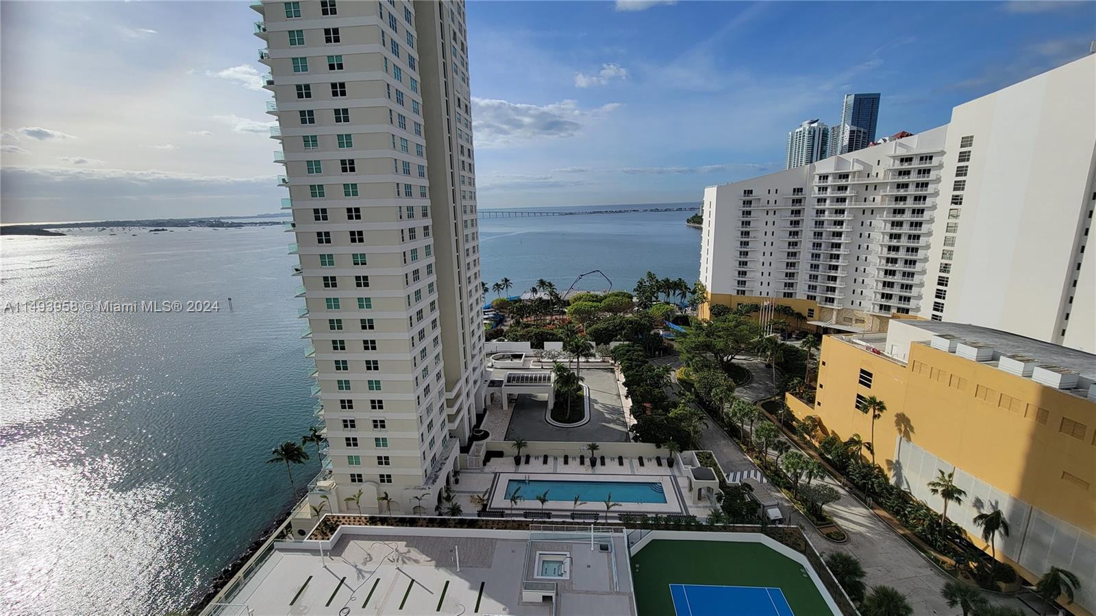 VIEWS, VIEWS, VIEWS! Biscayne Bay and Brickell skyline at its BEST. Spacious 1-bedroom 735 sq. ft. inside desirable Brickell Key Island neighborhood. BEST PRICE IN THE BUILDING on the 19th floor with all the amenities this condo building has to offer, just finishing a total upgrade of the 4th floor pool, tennis court, and mini golf area. All amenities, gym with direct ocean views on the 2nd floor, a large, well-equipped business center on the 3rd floor. Unit has white tile floors throughout, Bosch Heat Pump system installed new in 2021, Washer and dryer, balcony. Walk out the back door to the pedestrian boardwalk that wraps around the island and connects to the famous Miami City Center. * ATTENTION INVESTORS: TENANT OCCUPIED WITH A LEASE THRU 09/30/2024; same tenant for past 5 years.