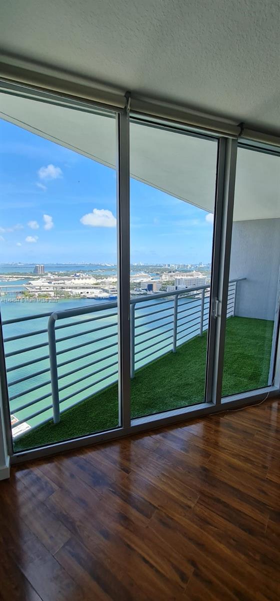 Beautiful Apartment at ONE MIAMI EAST CONDO with magnificent views over Miami Bay and Surrounding Skyline. One Bed, One Bath located on a 36th Floor, Living/dining area opens to a covered balcony. European-style kitchen cabinetry with granite countertops. Laminate floors and impact windows throughout excellent natural light, great condo amenities, and supreme location in Brickell. Direct access from the Miami Riverwalk Promenade to Bayside Marketplace. Building amenities are two pools, a jacuzzi, 2 gyms, 2 party rooms, a sauna, a kid's room, a business center, and EV charging. Assigned parking in the secured garage. 24 HR optional Valet Parking is right at your front door. Steps from the InterContinental Hotel and just near the lobby there is Il Gabianno Restaurant.