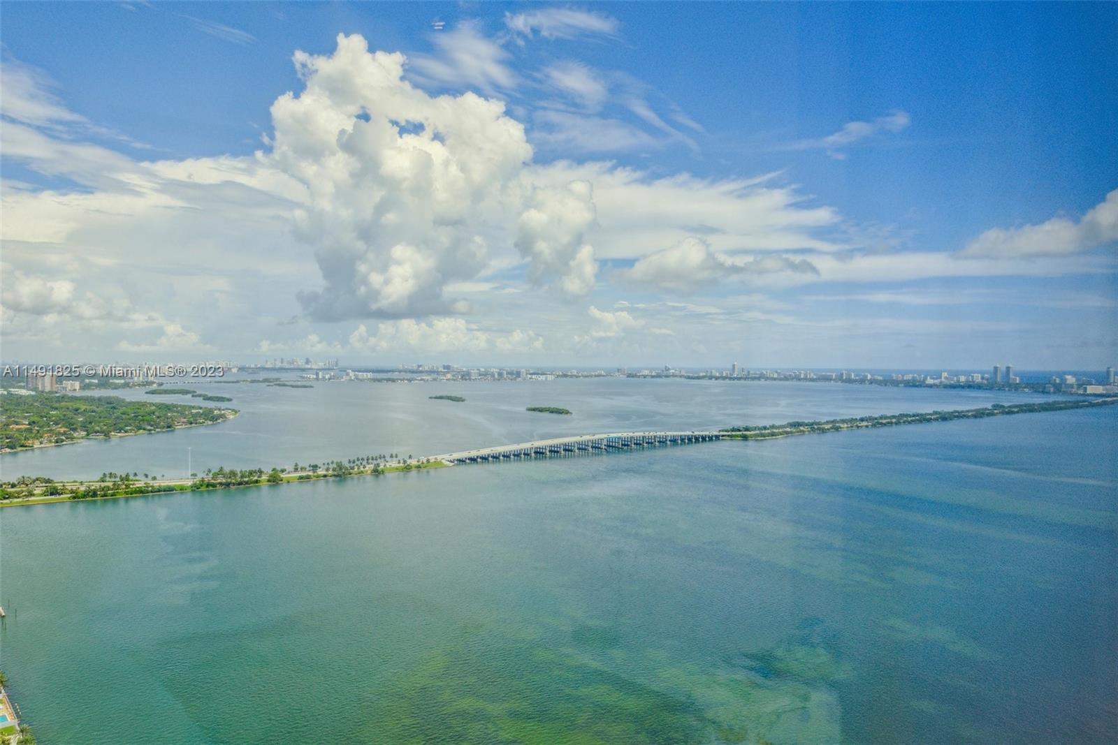 This ultra-luxury fully furnished condo showcasing legendary furnishings by Roche Bobois epitomizes a casual elegant Miami lifestyle. Ten foot floor-to ceiling windows capture sunsets with 180 degree spectacular bay+city views. This 44th floor corner residence faces north highlighting unbroken waterscape scenery.  Unrivaled finishes include:marble floors, Italian kitchen cabinetry, island kitchen +Wolf appliances, high-end bathroom fixtures, custom closets+deep balconies. Located in the trendy East Edgewater neighborhood, Missoni is central to the Design District and to everything one needs.Plentiful resort style amenities create the casual luxe lifestyle:best-in-class spa, 3 pools, tennis, fitness center, theater room, game room, full-service concierge, pet salon,+ more.  Easy to show.