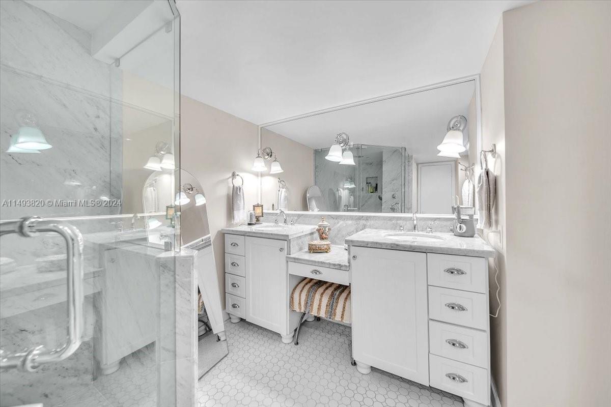 Primary Bathroom with x-large shower and built-in storage
