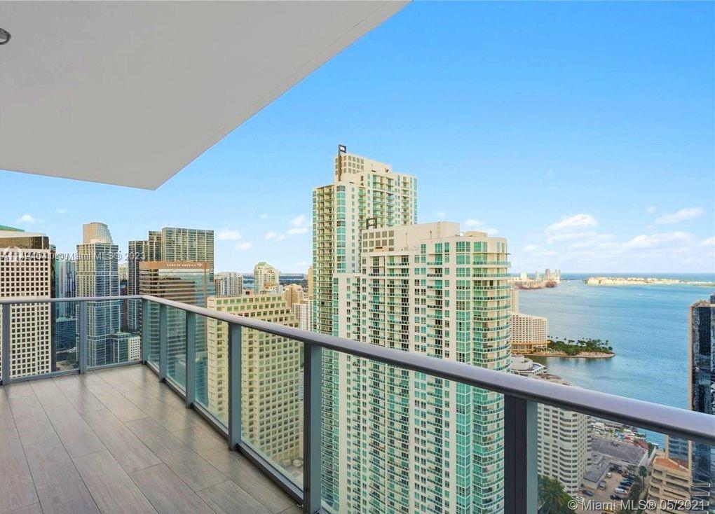 High floor and spacious corner unit, with 3B plus Den and private elevator. with 180 degrees of amazing views to Brickell & Downtown skylines. The balcony is ample and comes with bbq/summer kitchen. Most spectacular amenities 2 complete floors of entertainment, Indoor heated pool with retractable glass, parent/child pairing wristband system, state of the art gym & spa with steam baths, basketball & squash courts, jogging tracks, bowling & mini golf/simulator, game room, playground, movie theater, business & social rooms, valet, roof top & sun deck with views to die for, bar, pool & jacuzzi.