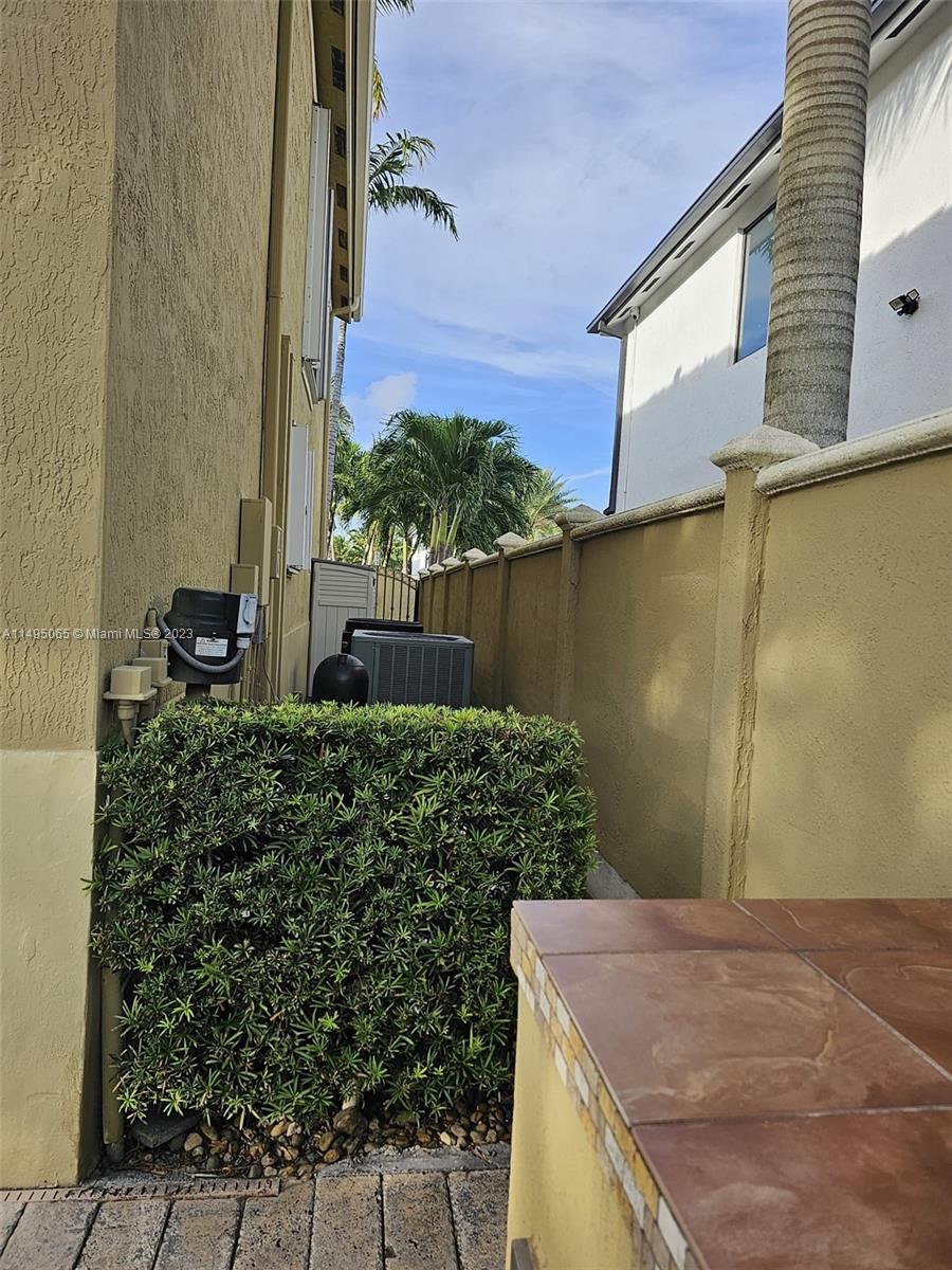 SIDE OF BACKYARD