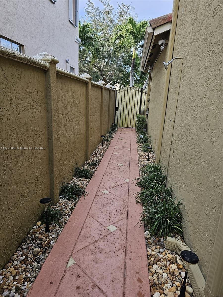 SIDE OF BACKYARD - POOL SHOWER
