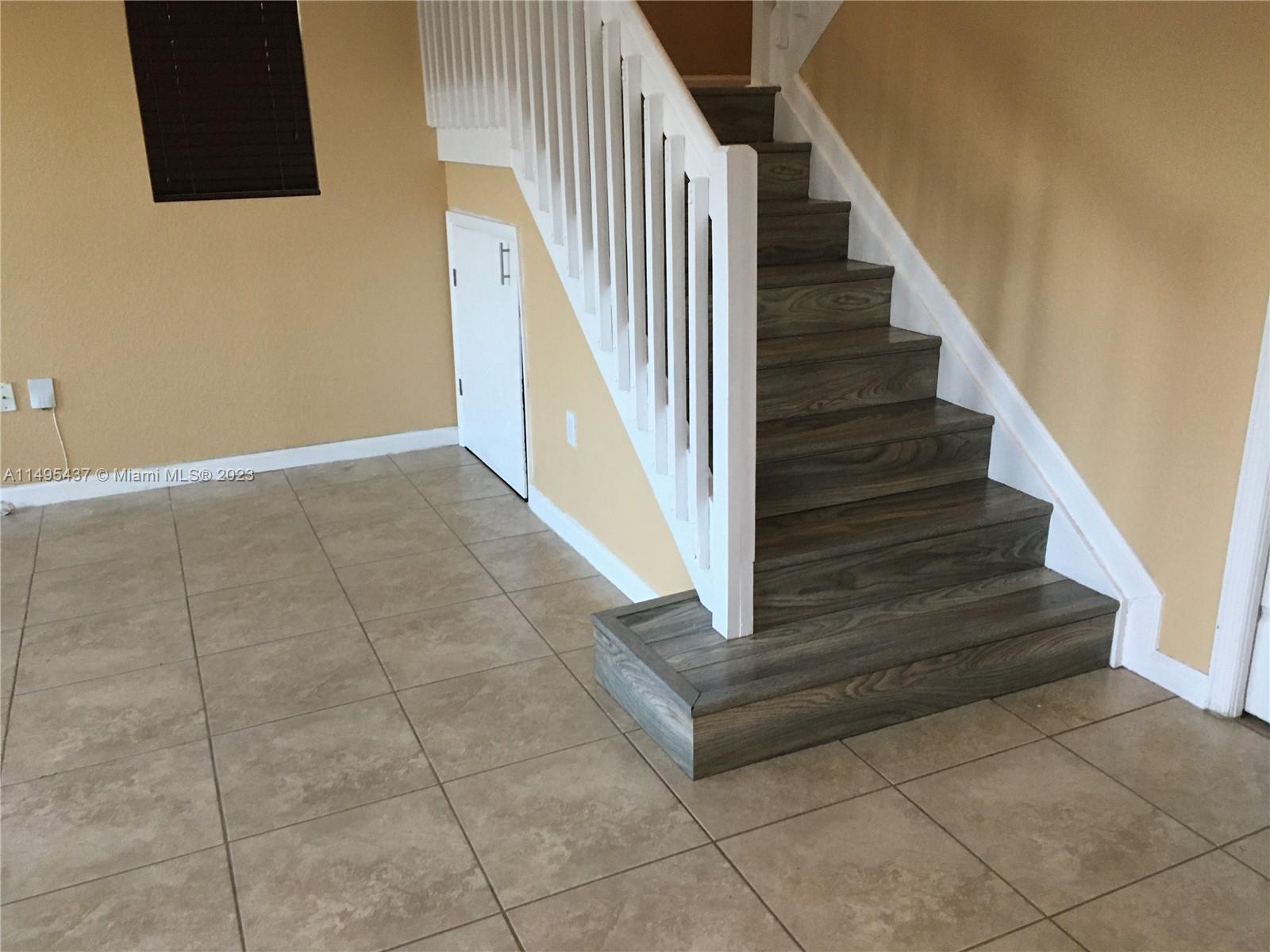 Family room + stairs to second floor