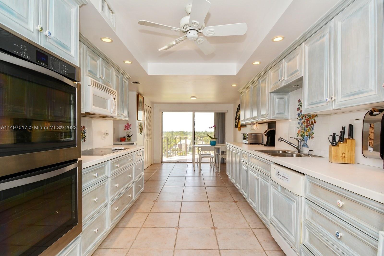 Large Eat-in kitchen with city view. Plenty of storage. Washer/dryer.