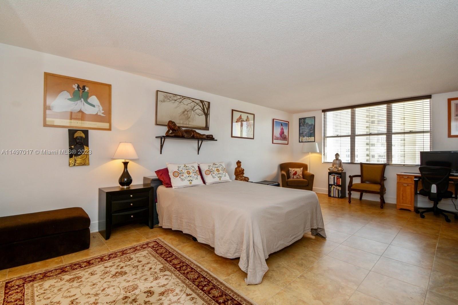 Large master-bedroom with walk-in closet and water views.