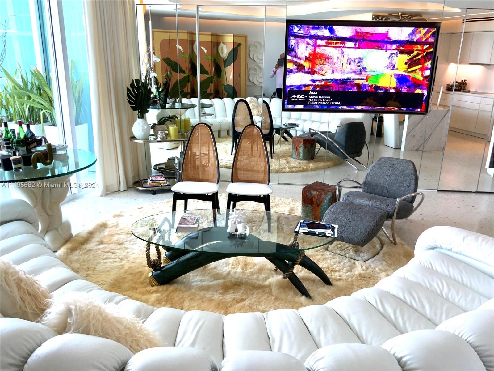 Organic shaped Coiffered ceiling conceals new A/C system & lighting, and displays original art