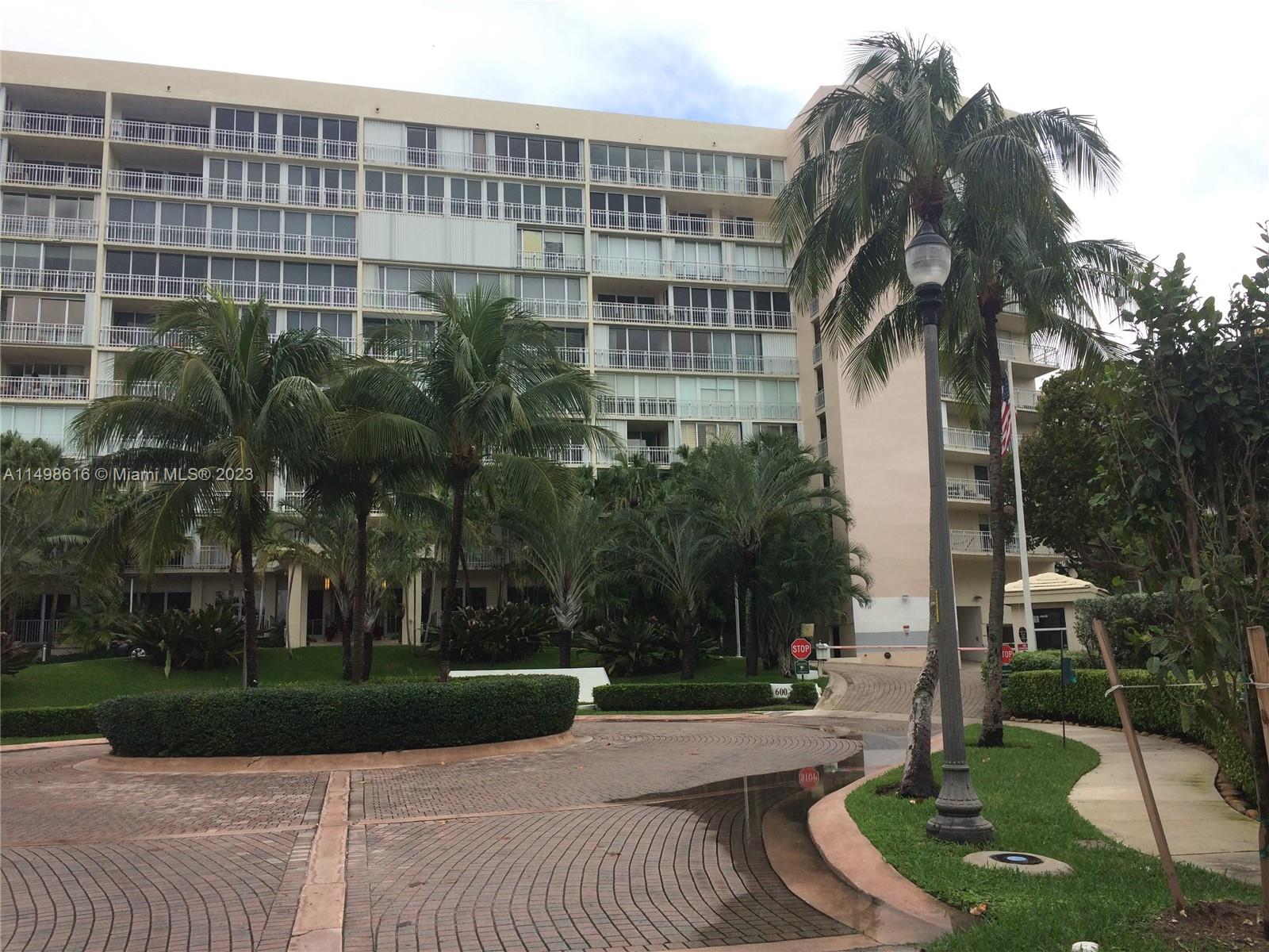 Unfurnished spacious 3 bedroom apt, high impact windows.  Den/office off master bedroom.  Parking space conveniently located near entry door.  Lobby beautifully remodeled.  Amenities include private beach access, pool, BBQ area, tennis, gym, party room, concierge.