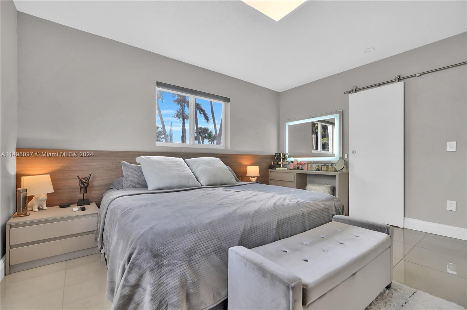 Main bedroom is a suite and comes with custom bed and cabinetry