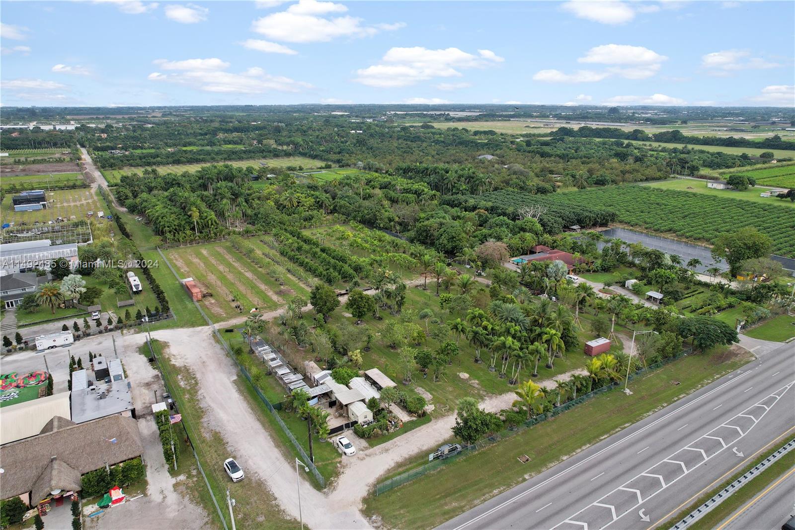 VIEW OF 5 ACRE ON KROME AVE W/ OWN DRIVEWAY INTO PROPERTY. OFFICE BUILDINGS, STORAGE, OWNERS APT,KENNELS...SEPTIC, WELLS, POWER ON SITE. HAS A SIDE ROAD..
