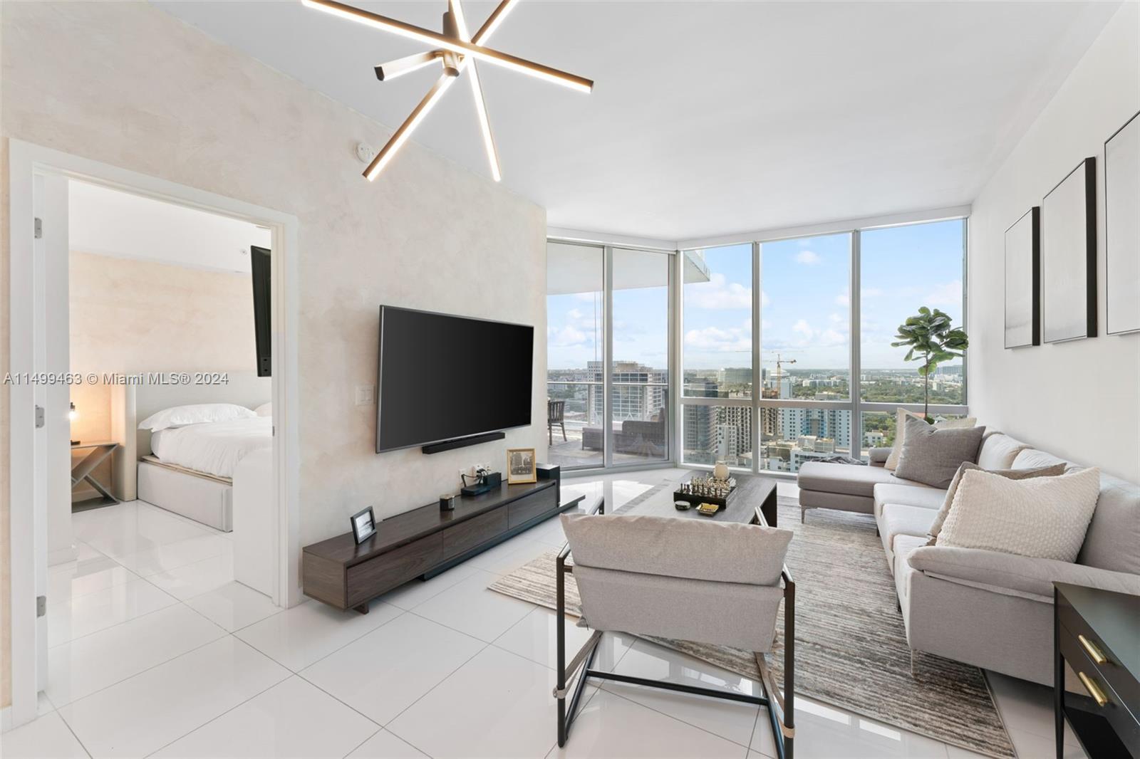 Experience elevated living at its finest in the highest 08’ line available at Paramount Miami World Center! Spacious 2 bedroom + Den with 3 bathrooms, Den can easily be converted into a 3rd room or an enclosed office space. The unit has a private elevator, unbelievable sunset views, and a deep 16x12 large balcony. Paramount is well known for its central location & as the most amenity-filled building in the world, just steps from the Kaseya Center (Miami Heat), minutes from the highway, and all of Miami’s main attractions. Exquisite amenities include five pools, gym with a boxing ring, game room, golf simulator, a half basketball court, a children’s play room, soccer field, tennis, spa, recording studio, market, rooftop pool w/ 360 views of Miami. Great investment opportunity! Easy to show!
