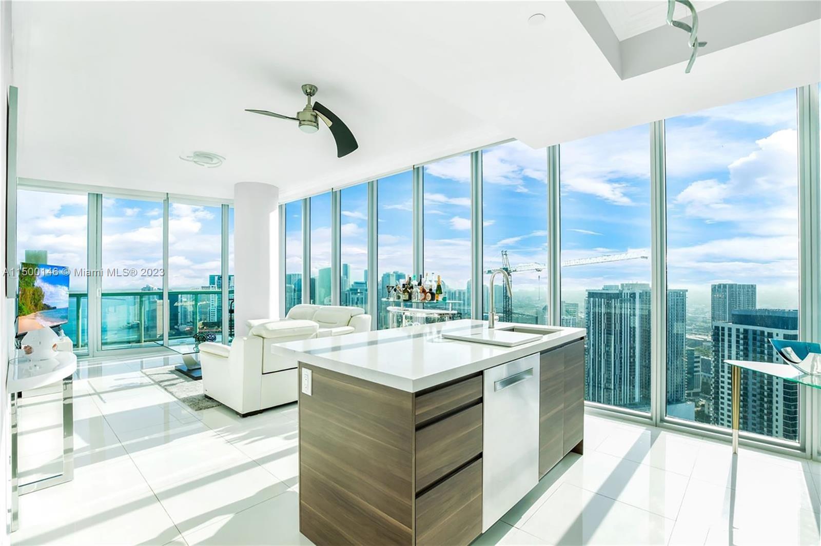 Step into this stunning 2 Bed condominium situated in the 01 line on the 53rd floor.. Captivating views span across the Miami skyline and provide direct ocean perspectives of Biscayne Bay, Miami Beach, as well as the dazzling city lights of Brickell and the Miami World Center. Positioned at the southeast pinnacle of the building, Line 01 holds the coveted status of being the most sought-after within Marina Blue. This unit underwent a comprehensive transformation, featuring brand-new crown molding & fully renovated kitchen boasts top-of-the-line Bosch appliances, quartz backsplash, new cabinets, and includes a $1,500 Woodbridge toilet bidet in the master bathroom. Additional highlights comprise built-in closets, all-electric switches, and custom lighting installations!