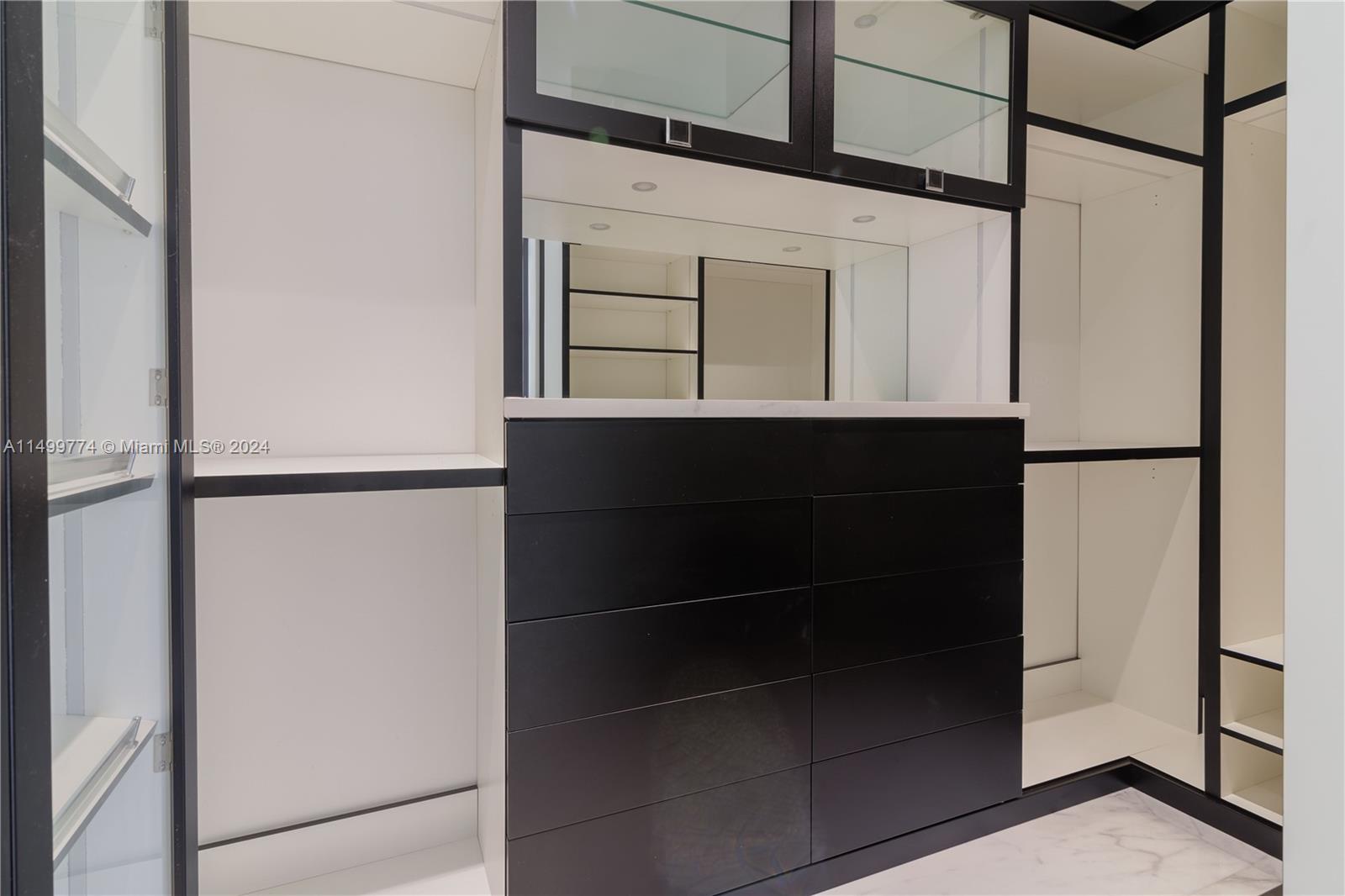 The design of the double closet seamlessly integrates into the overall aesthetics of the bedroom, creating a harmonious and functional environment