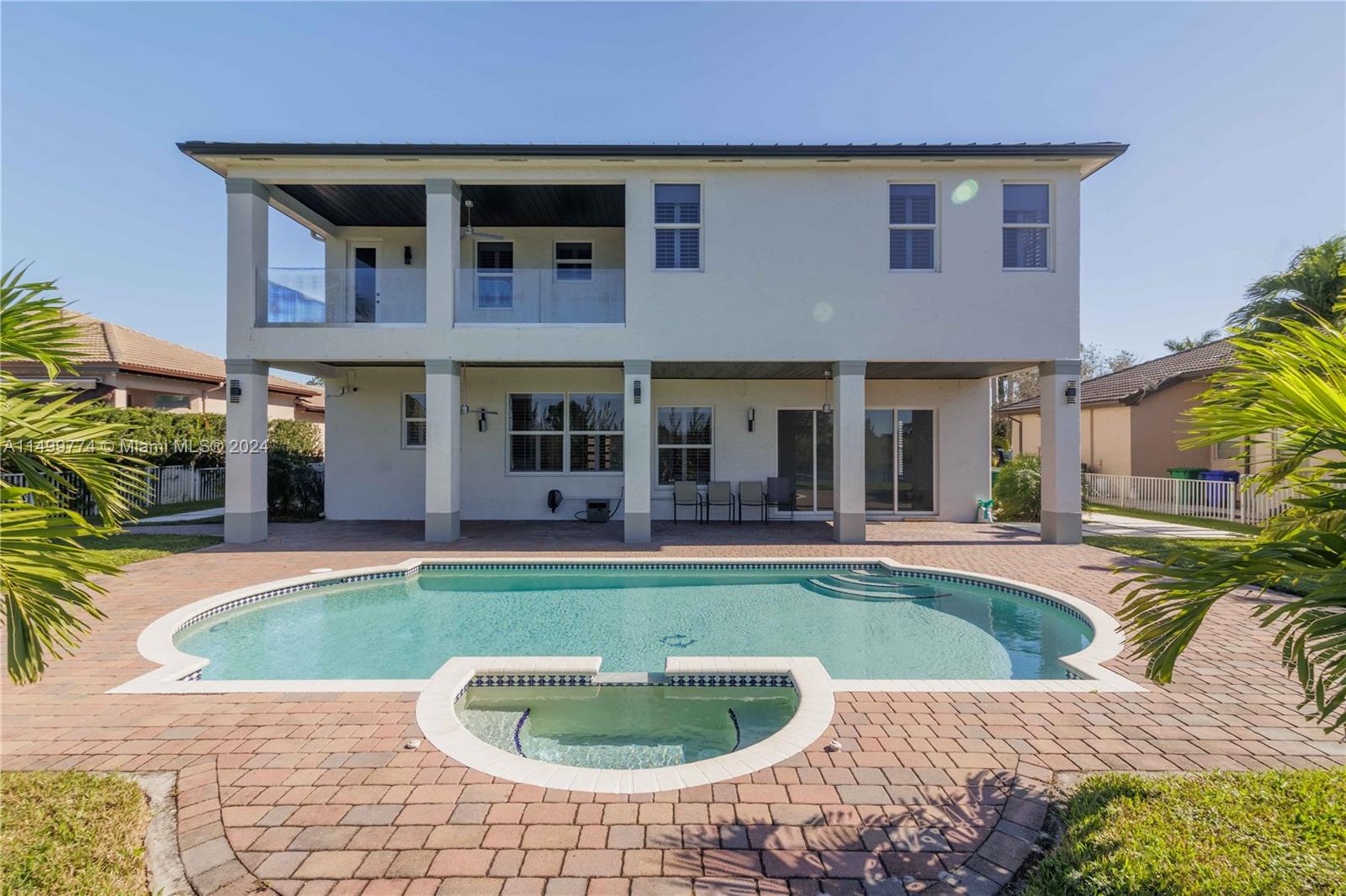 A 19 x 29-foot pool in a 14,800 square foot lot is an impressive feature that can provide an atmosphere of fun, relaxation, and outdoor entertainment. Here's a description of this pool on a lot of that size