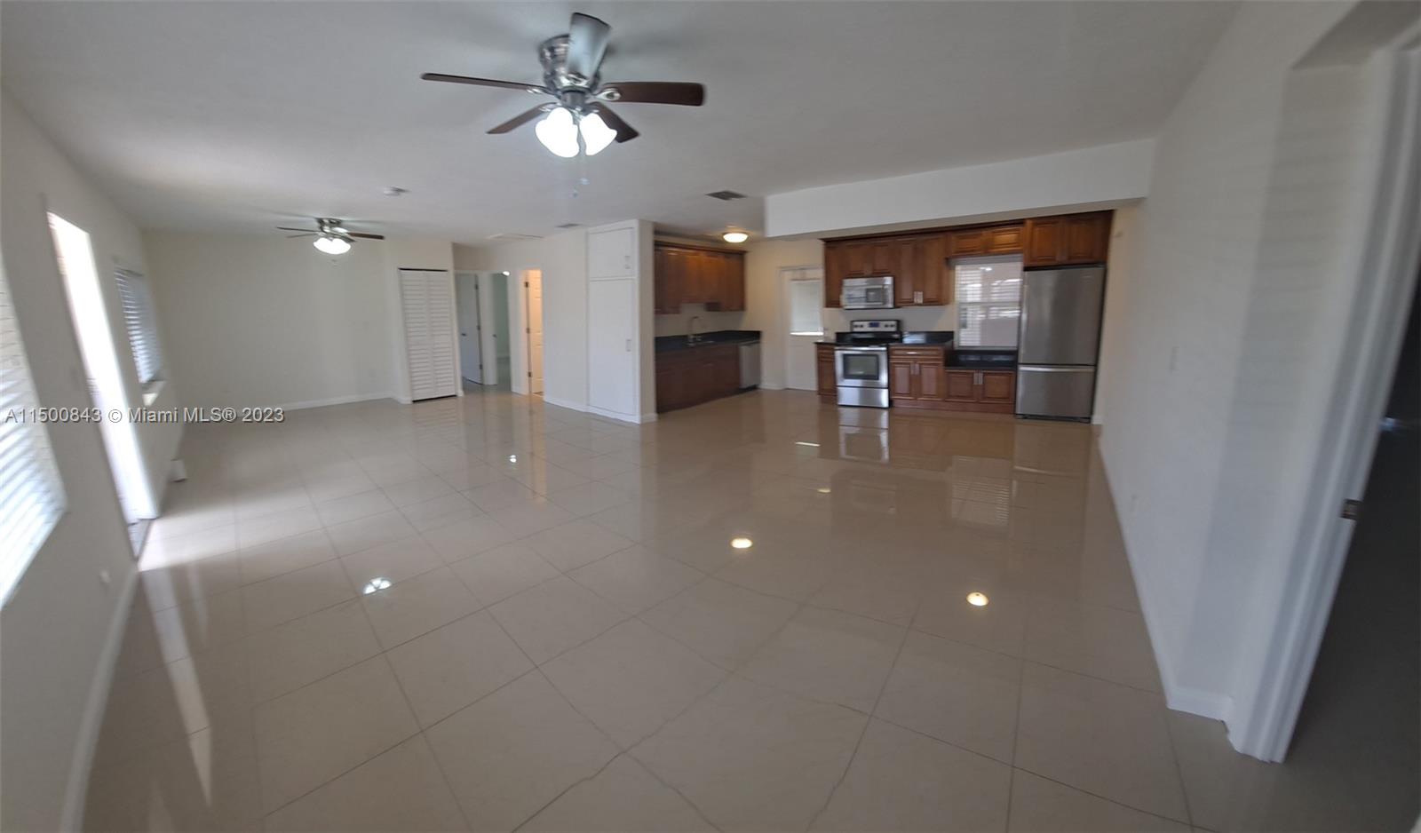 Large look on living room plus dining area plus kitchen