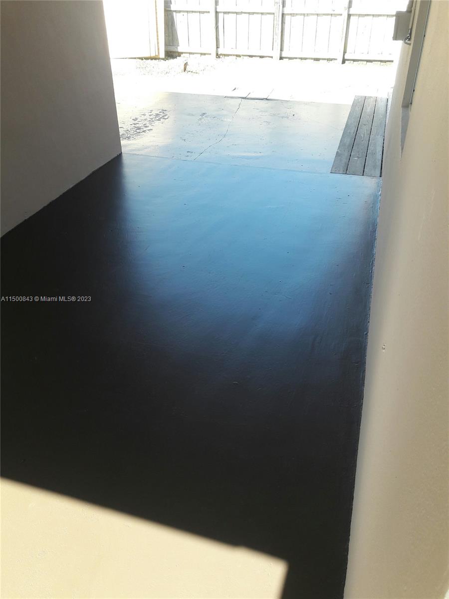 Porch between kitchen and Extra room