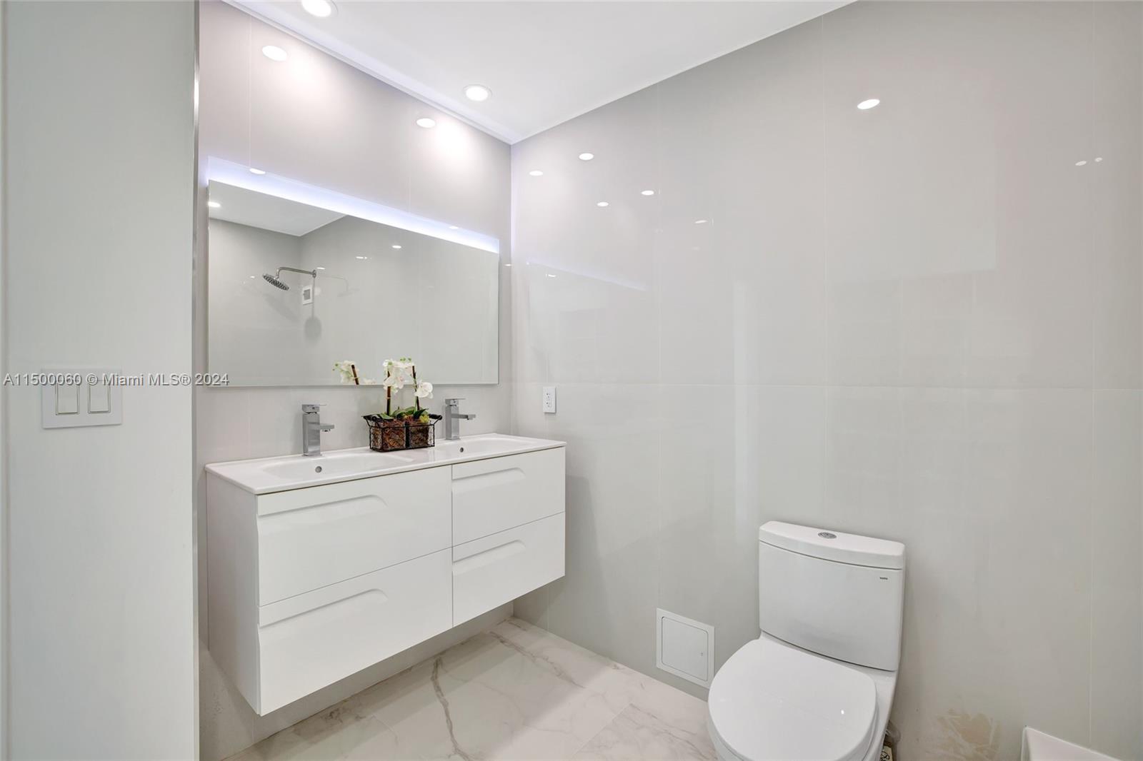 PRINCIPLE BEDROOM SUITE WITH CUSTOM LIGHTING, HIGH VOLUME 9 FT CEILINGS AND PENTHOUSE  COASTAL OCEAN VIEWS