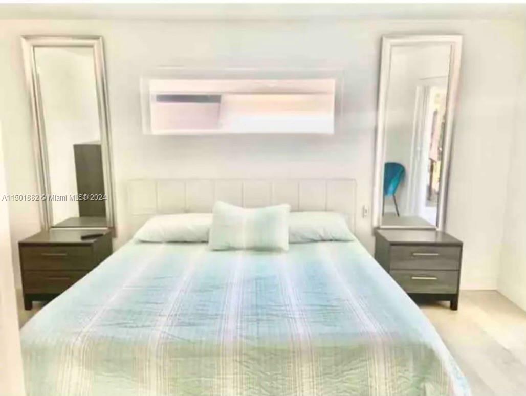 Master Bedroom with walk-in closet, entrance to Patio