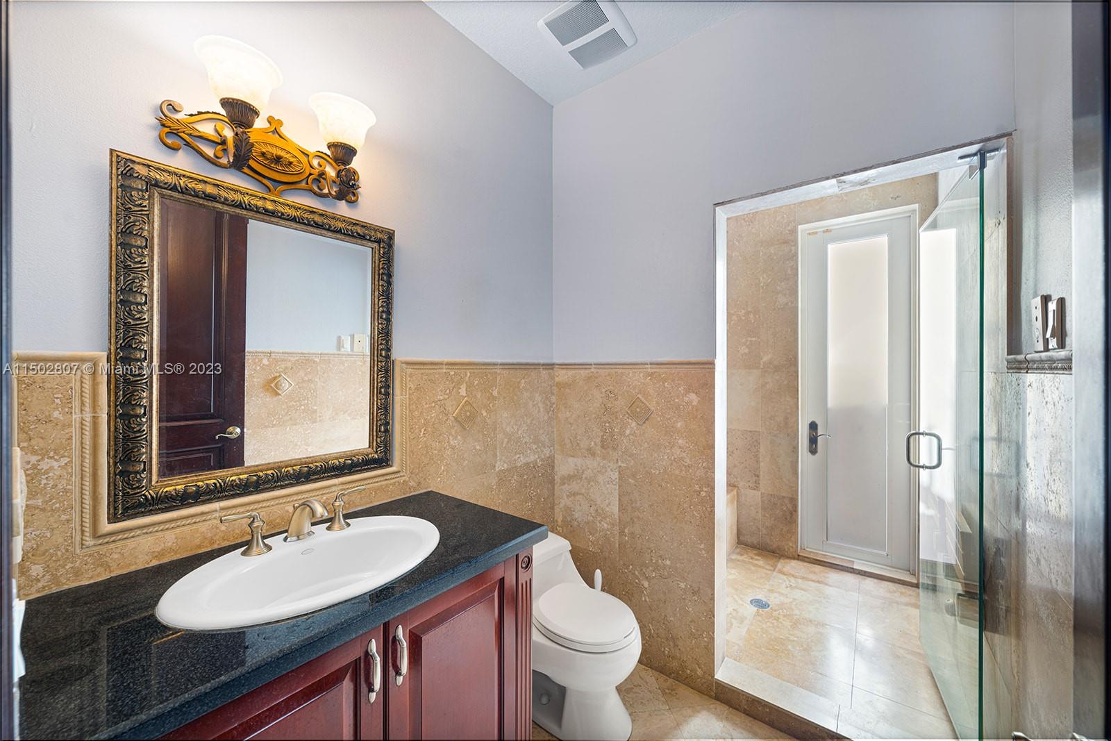 Cabana Bathroom with steam room (Bath #2 downstairs)