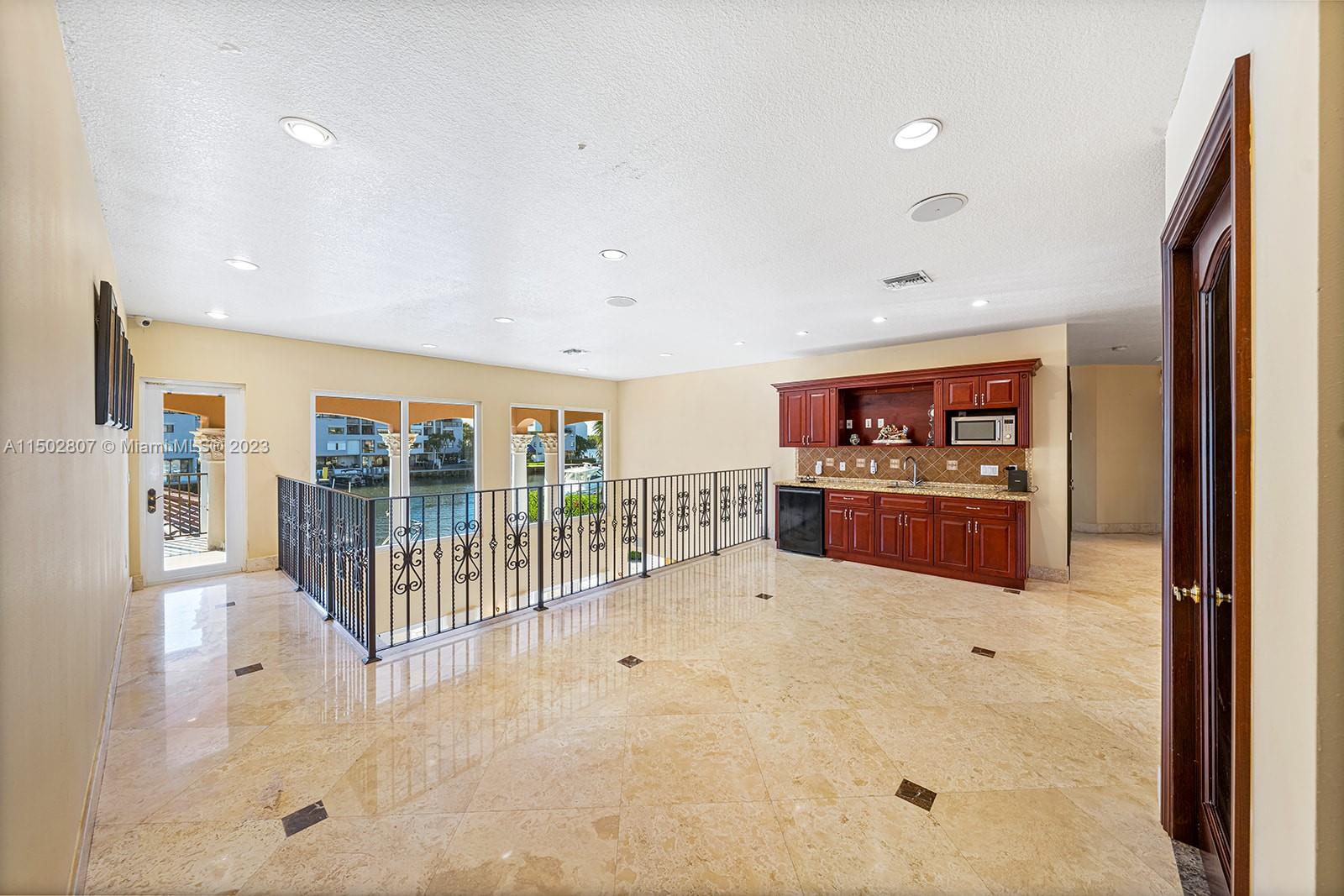 Living area upstairs with kitchen