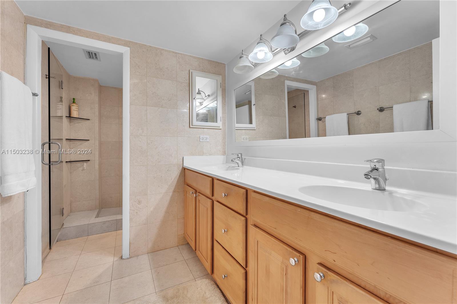 Master Bathroom - Double sinks and ample storage space