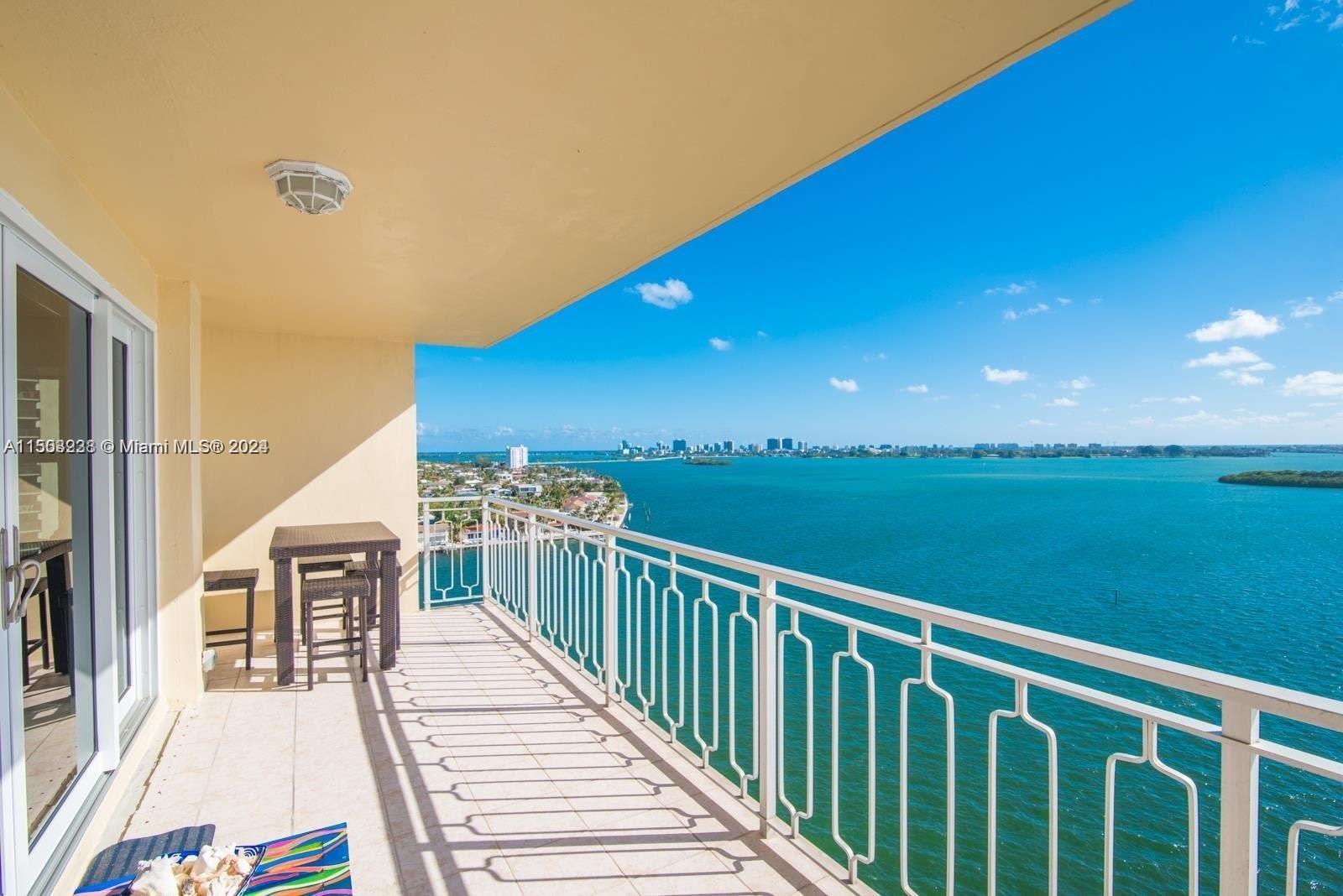 Spacious living area with a formal dining room, offering abundant space and captivating views at every turn.