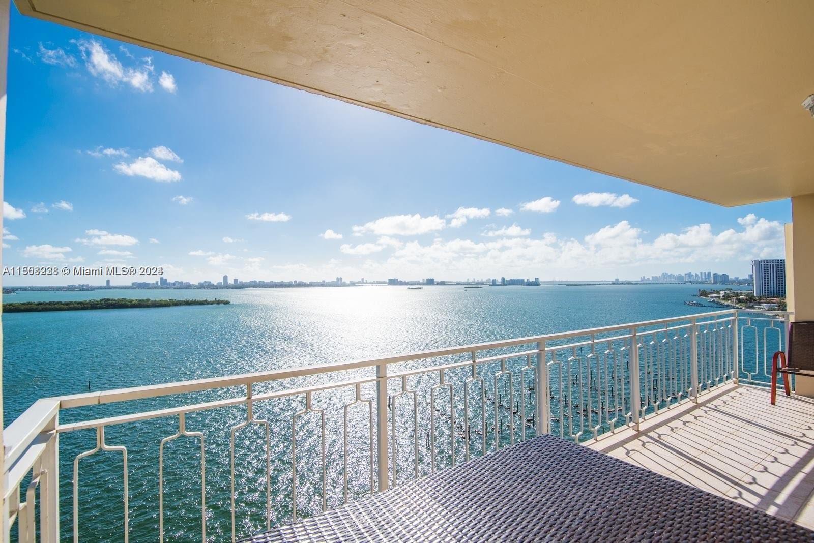 The kitchen seamlessly integrates with the living area, offering breathtaking views. It's in impeccable condition and easily updateable to suit the new owner's preferences