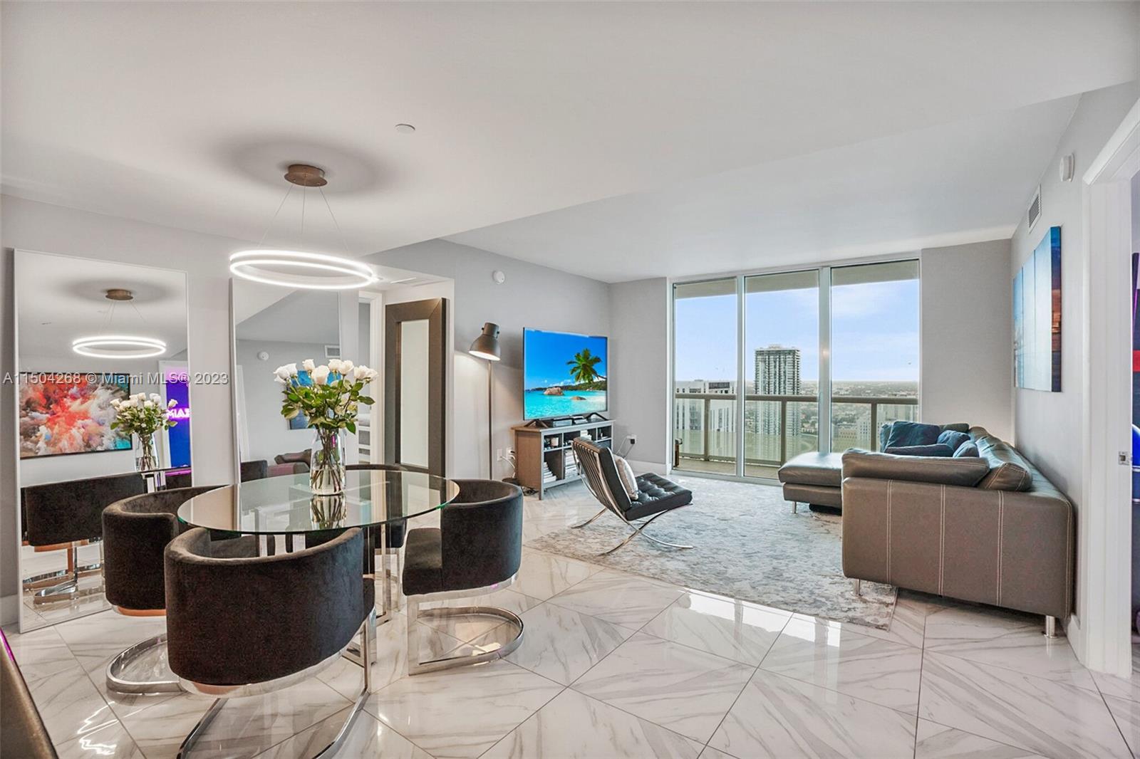 This 46th FL corner unit at 50 Biscayne features 2 Beds, 2 Baths w/ a large wraparound balcony facing South & West. Enjoy the sunset year-round with sweeping unobstructed views of the city on one side & partial bay views on the other. This split floor plan features an open kitchen/living room layout, floor-to-ceiling impact windows, HomeKit/Alexa/Google Home switches/controls, & 1 garage parking. First-class amenities include a 24-hour concierge, fitness center, sauna & spa, infinity pool & jacuzzi w/ cabanas, social room, & valet parking. Located in the heart of Downtown, with easy access to Miami Intl airport & Brightline station. 1 block from Metromover/Metrorail. Close to Arena, Perez Art Museum & Arsht Center, the finest restaurants, Whole Foods, and shops at Brickell City Center.