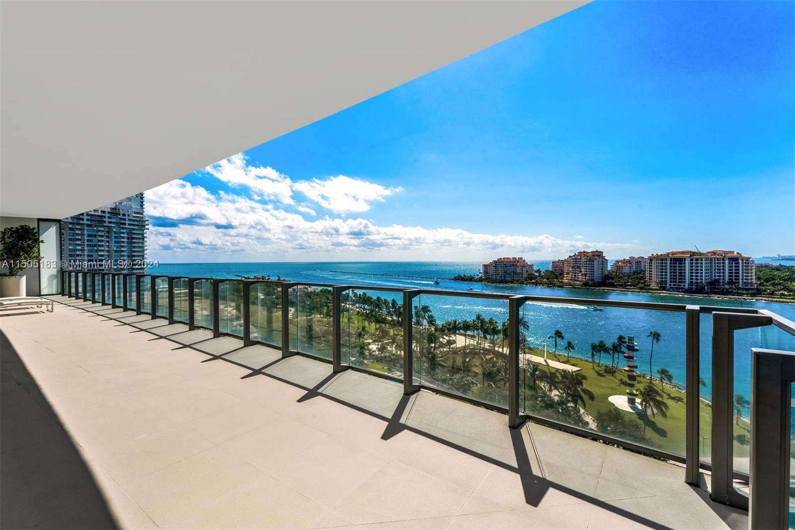 Immerse yourself in unparalleled ocean, city, and bay views from sunrise to sunset in this extraordinary, west-facing corner residence in Apogee’s coveted 04 line. Impeccably designed by Luis Bustamante, this 4,154 SF home features an expansive 2,441 SF wraparound balcony with outdoor kitchen, floor-to-ceiling sliding glass windows, 10’ ceilings, private elevator landing, Miele kitchen appliances and wine fridge, media room, private 2-car garage, and designer finishings throughout. Spacious principal bedroom overlooks Fisher Island and the Atlantic and ensuite bath boasts twin showers and step-in soaking tub. Enjoy world-class amenities including fitness center, spa, infinity pool, valet, and concierge. Discover your home at Apogee, South Beach’s most prestigious community.