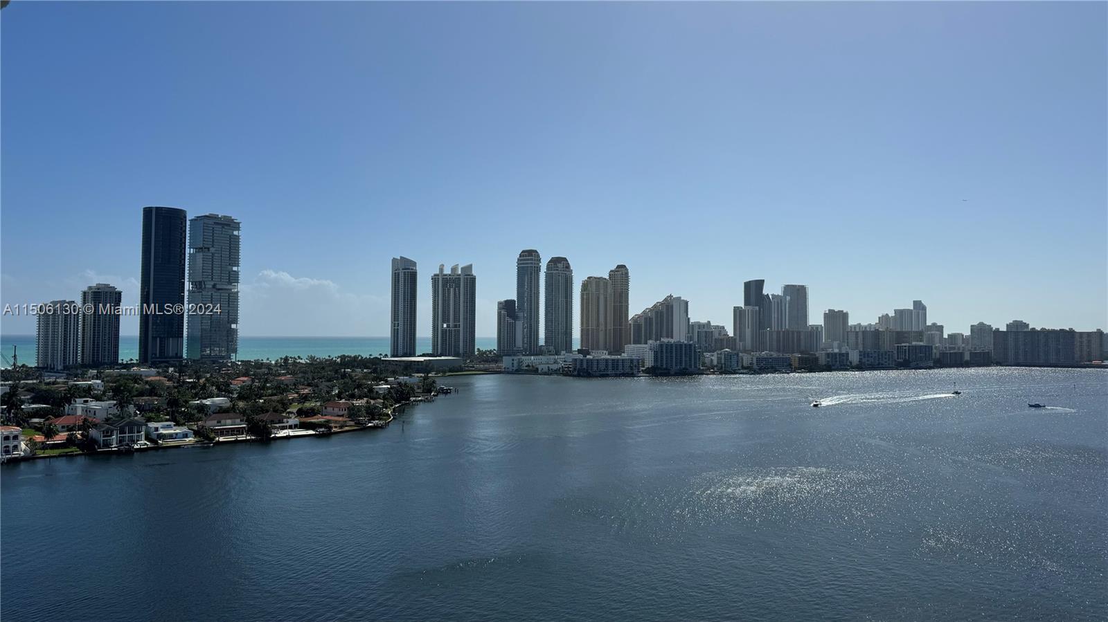 The ULTIMATE Penthouse! Rare opportunity to own the best unit in the area! UNIQUE VIEWS of the intracoastal and the ocean across Sunny Isles and all South Miami! 2 spacious bedrooms, 2 full bathrooms with shower and tub recently renovated. Exquisite marble floors throughout the unit and wrap around balcony! Tasteful tile floor on the living room and master bedroom! Brand new stainless steel appliances with washer and dryer. Comes with 3 assigned parking spots one of which is covered and can all be sold individually. Association includes cable, internet, water, trash, sewage. Owner pays only for electricity. Unit comes with assigned storage! Wait no more! Schedule a showing now!