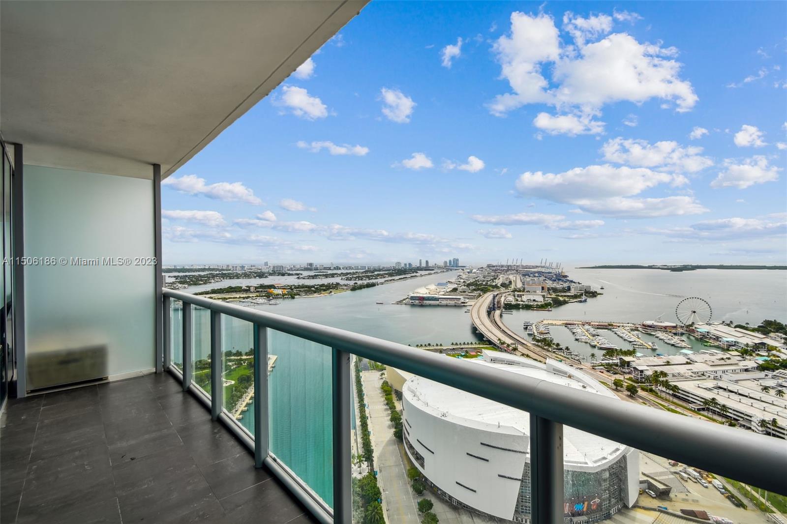 Incredible, unobstructed views of the Biscayne Bay and Downtown skyline from the 41st floor of Marina Blue. Slate tile floors throughout, blackout shades, custom closets in both bedrooms, and an extended kitchen bar area for practical dining. Master Bathroom has two sinks for convenience and storage, as well as a walk in standing shower and bath tub. Grand foyer entrance allows for privacy and the ability to customize the feng-shui of your condo from first sight. Marina Blue has two pools, huge fitness center, volleyball court, bbq area. Assigned parking space + storage space included, as well as internet and cable. Walk to Miami Worldcenter's retail and fine dining like Brasserie Laurel, Heat Arena, Perez Art Museum, Frost Science Museum. Ready to move in! Freshly painted.