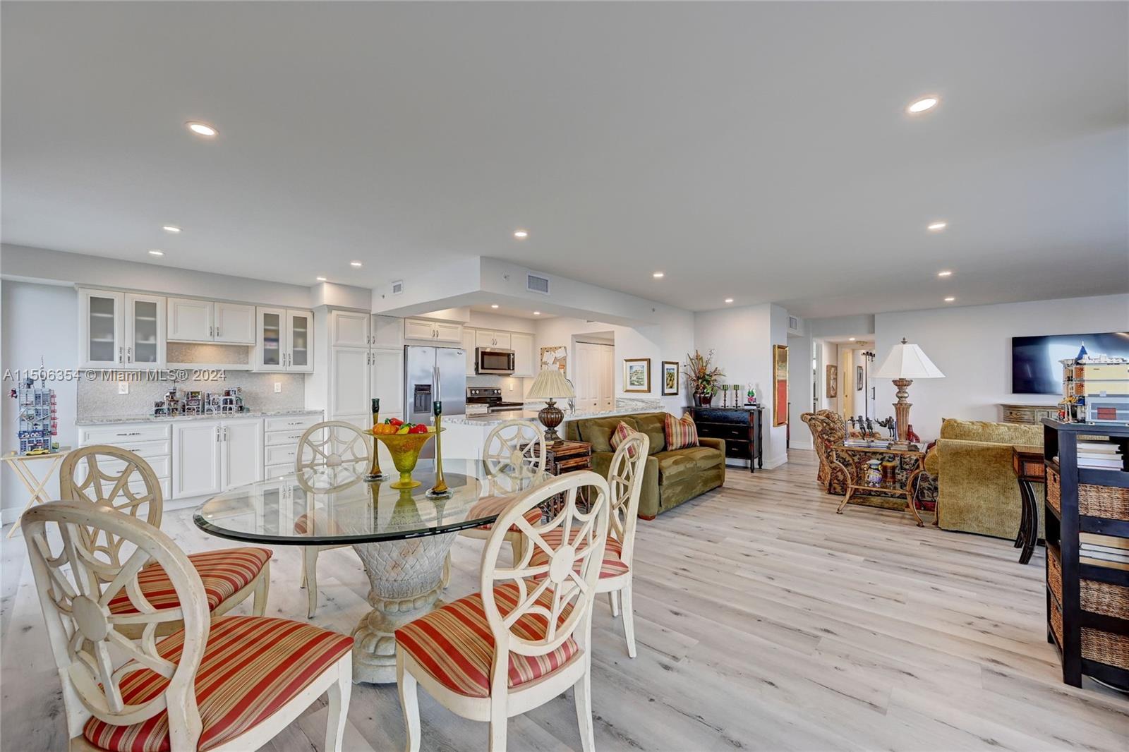 OPEN CONCEPT DINING ROOM, LIVING ROOM AND KITCHEN