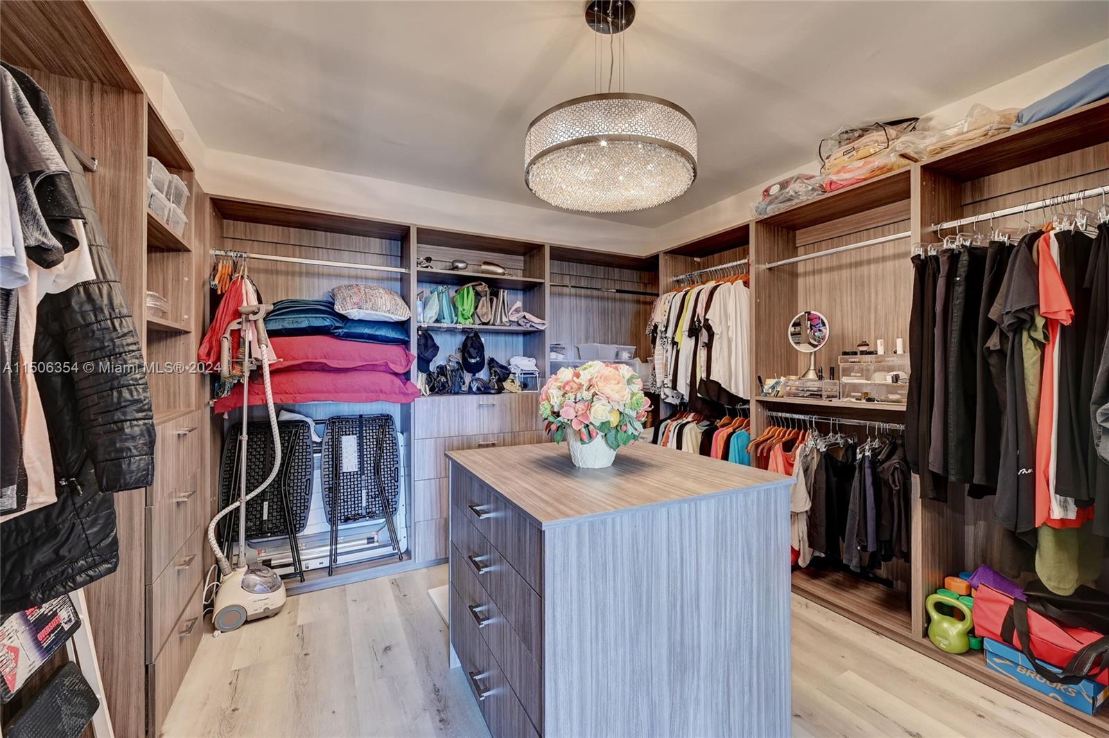 MASTER BEDROOM WALK IN CLOSET
