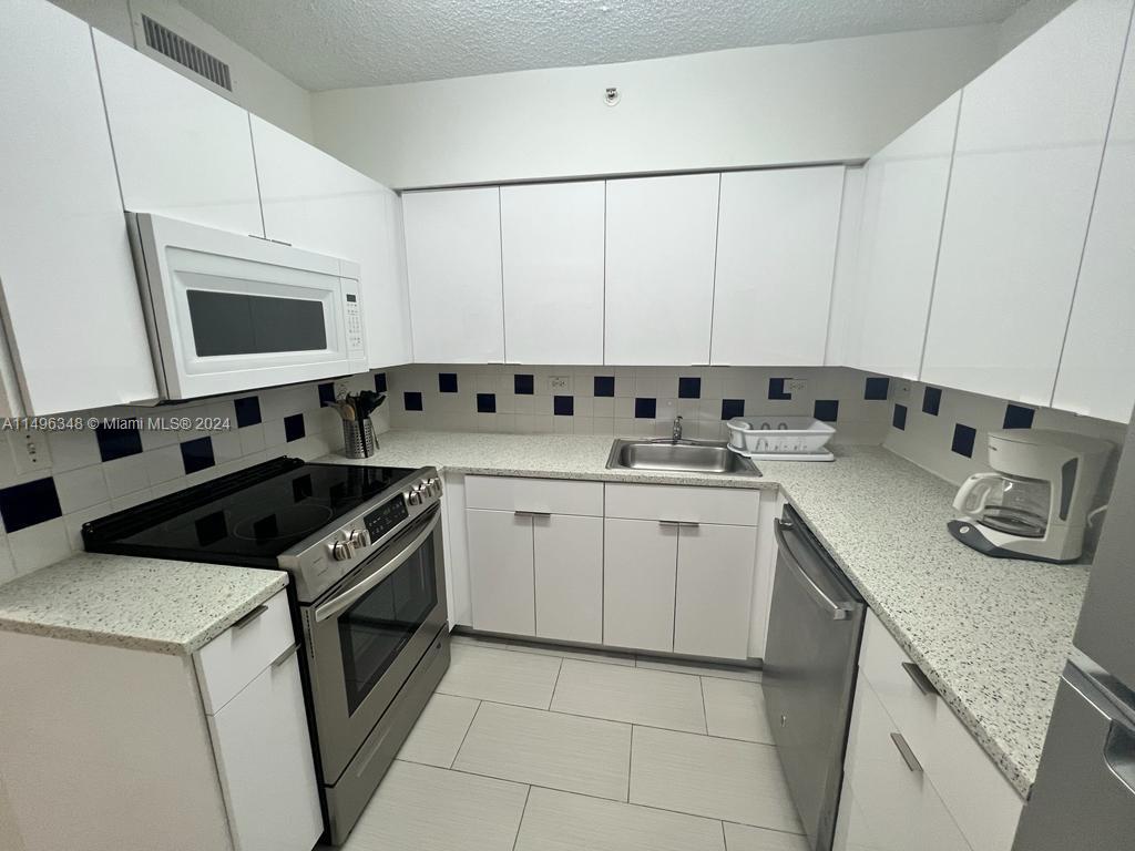 Clean, gleaming kitchen