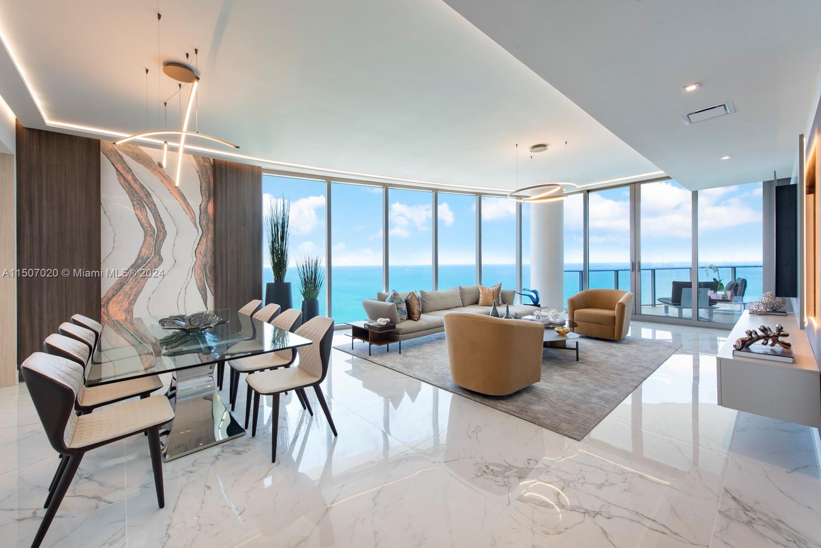 BRAND NEW. Modern contemporary oceanfront residence at the Ritz Carlton Sunny Isles. Unobstructed direct view of ocean, bay, sunsets & Miami skyline from every room. 3Bed+Den/4.1Baths. Open floorplan seamlessly connects the east & west living spaces. Filled w/ natural light. Designed by Steven G featuring a combination of stone, wood & mirrors creating a calming and welcoming environment. Oversized kitchen island perfect  for entertaining & host unforgettable gatherings, Snaidero Italian kitchen w/ Miele/SubZero appliances, master suite w/ endless directocean view. Built-in closets, electric black outs. Amenities: onsite restaurant, complimentary breakfast, 2 pools, Gym & Spa, kid’s area, complimentary valet. The Ritz Carlton has no limits to offer its residents an extraordinary lifestyle.
